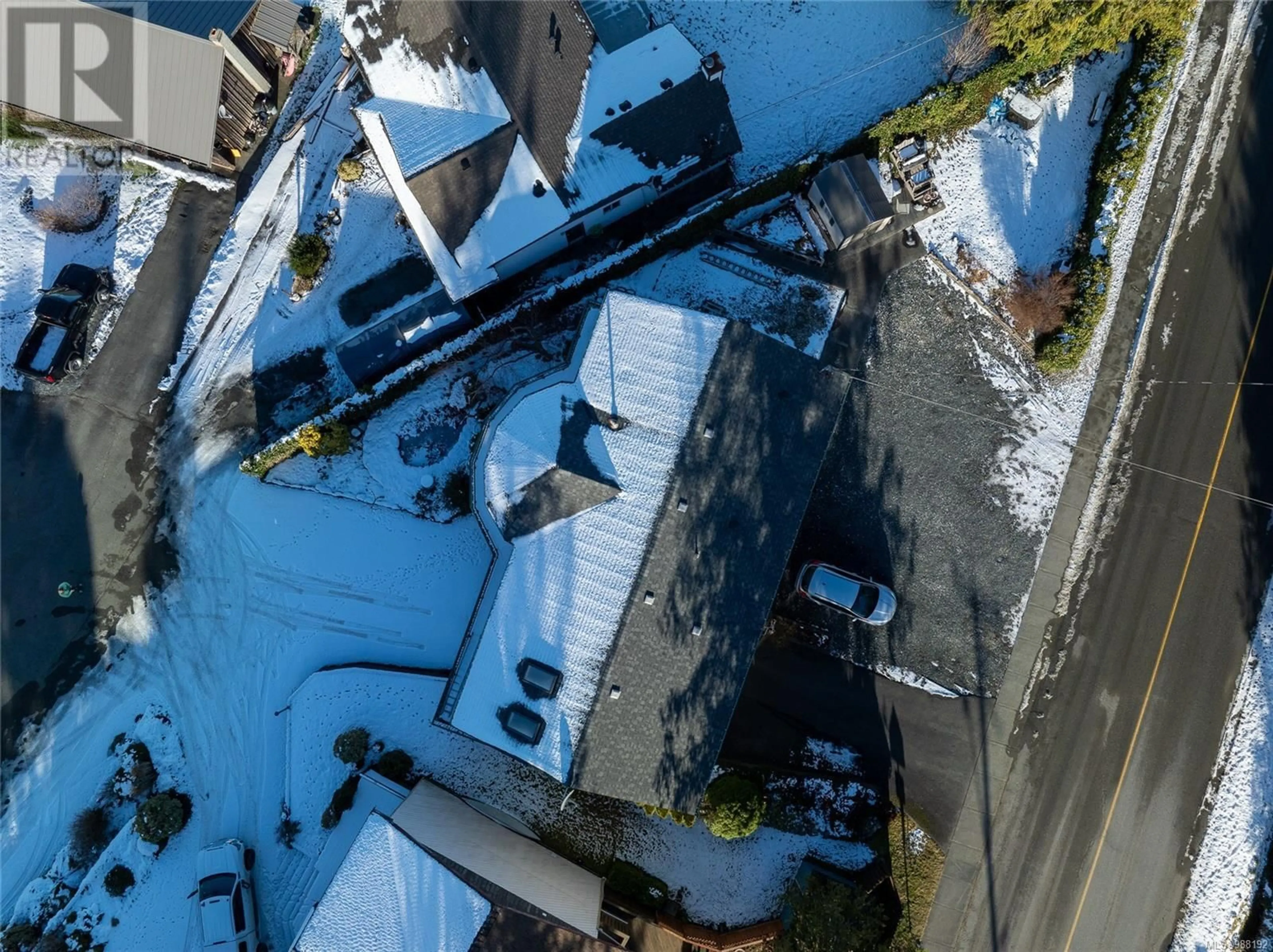 A pic from outside/outdoor area/front of a property/back of a property/a pic from drone, city buildings view from balcony for 2890 Mine Dr, Port McNeill British Columbia V0N2R0