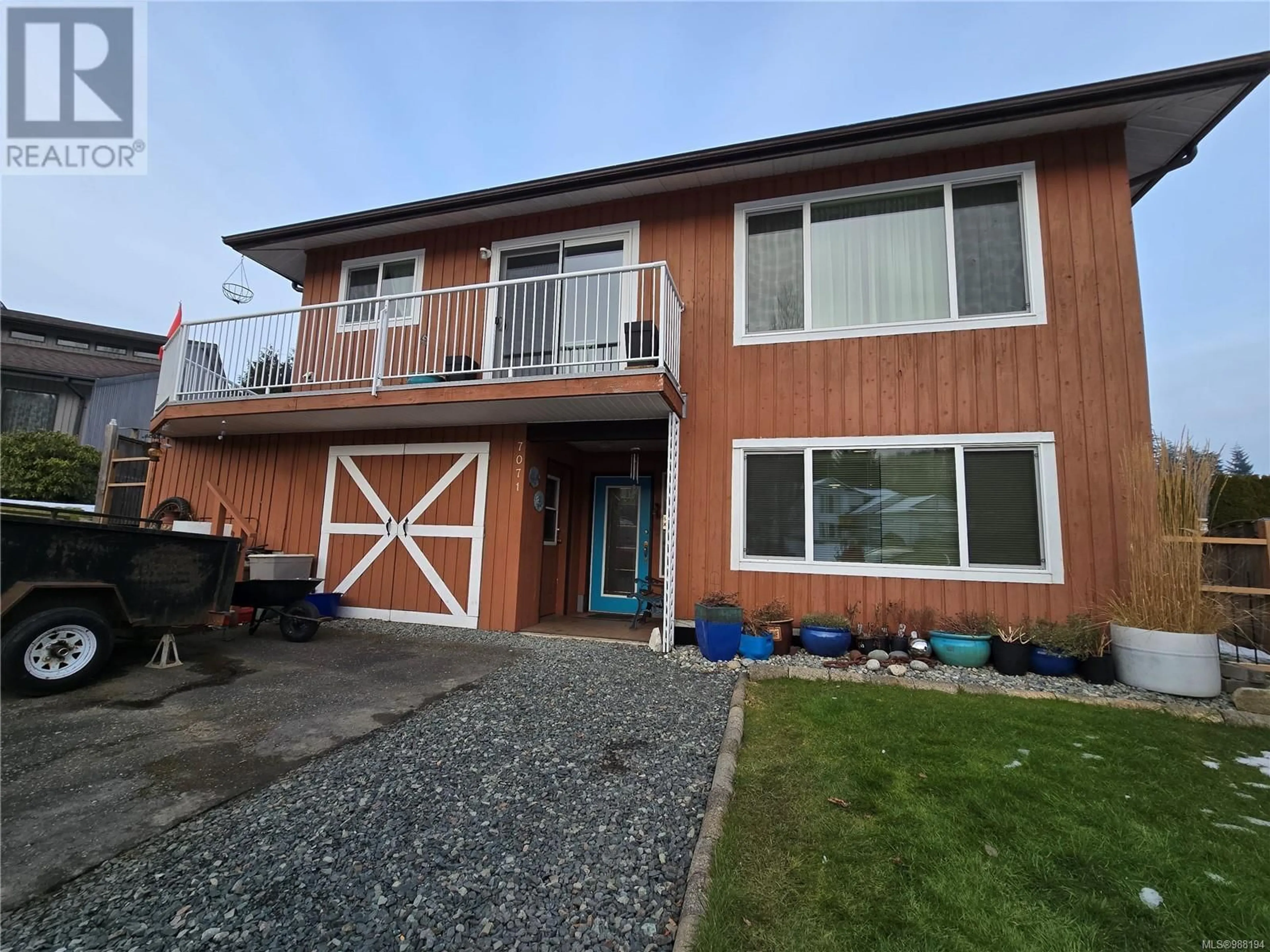 Home with vinyl exterior material, street for 7071 McDougal Pl, Port Hardy British Columbia V0N2P0