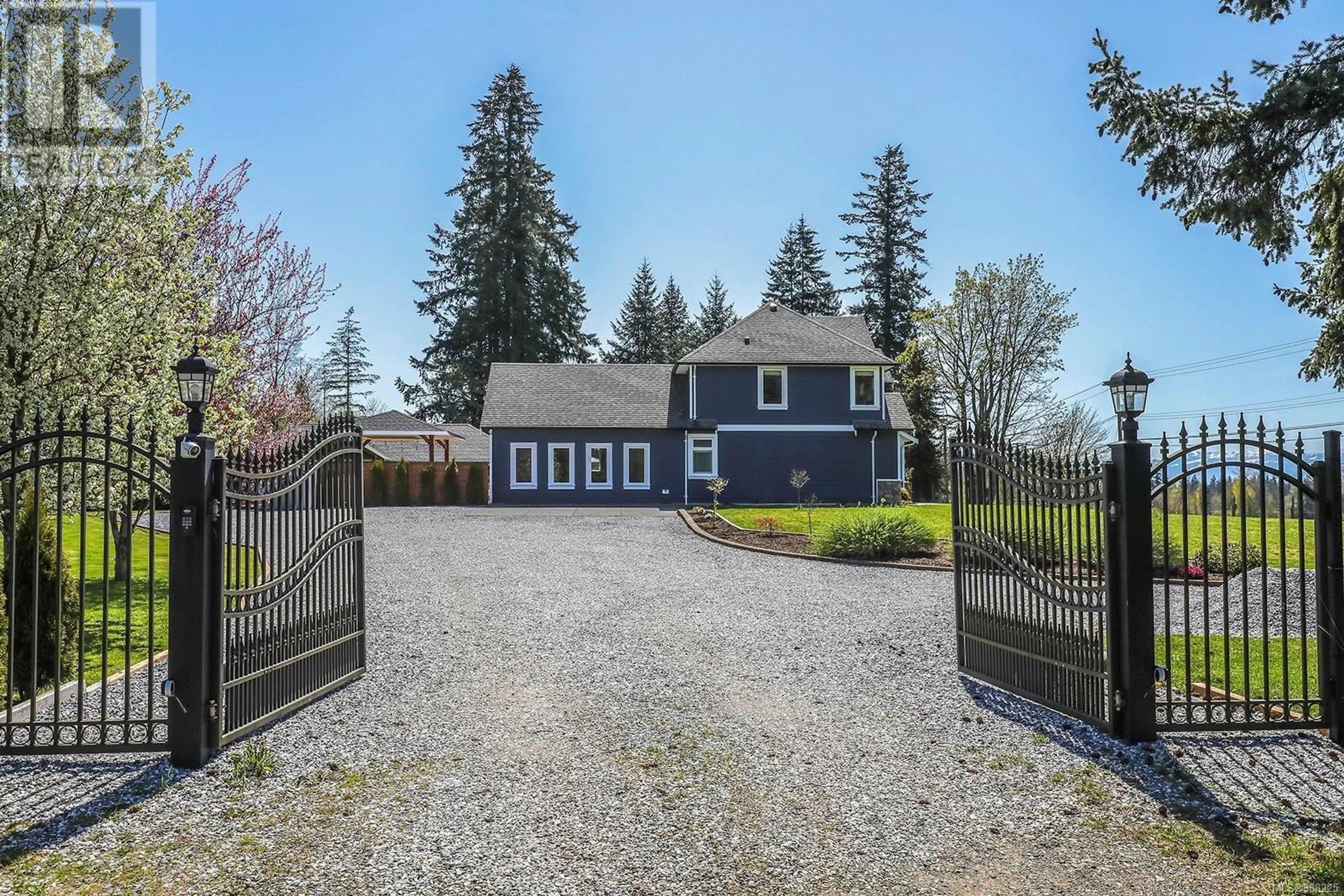 A pic from outside/outdoor area/front of a property/back of a property/a pic from drone, street for 2495 GRAHAM ROAD, Courtenay British Columbia V9J1T4