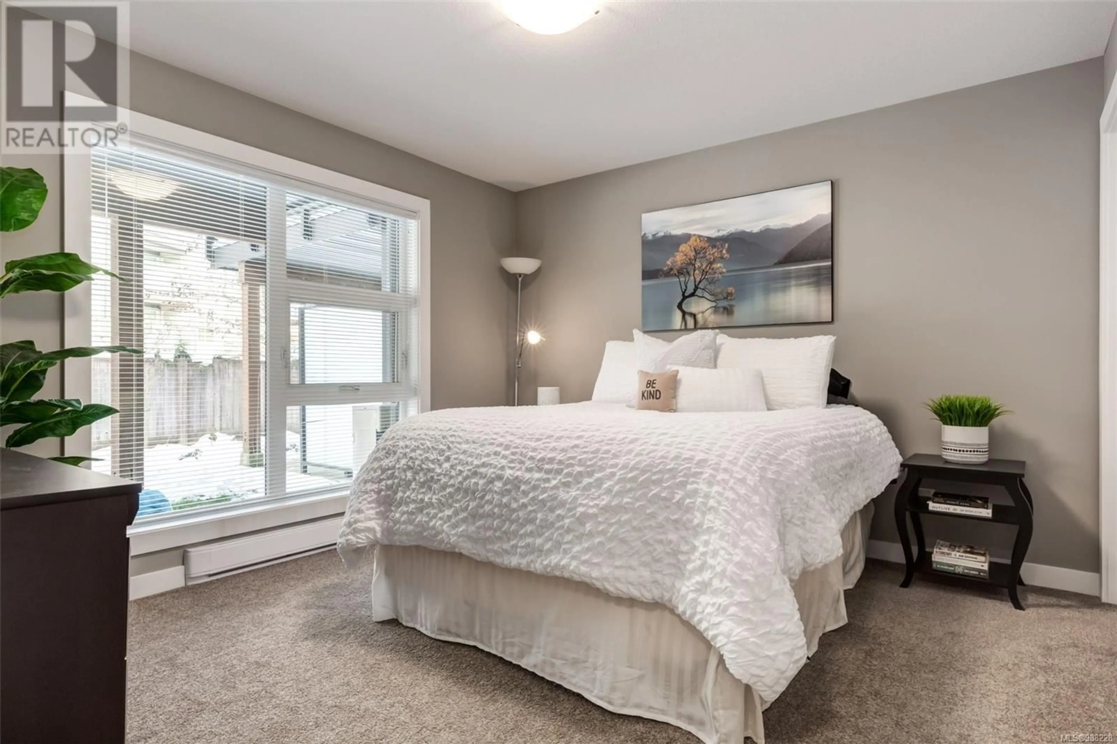 Bedroom with bed, unknown for 111 5240 Dublin Way, Nanaimo British Columbia V9T0H2