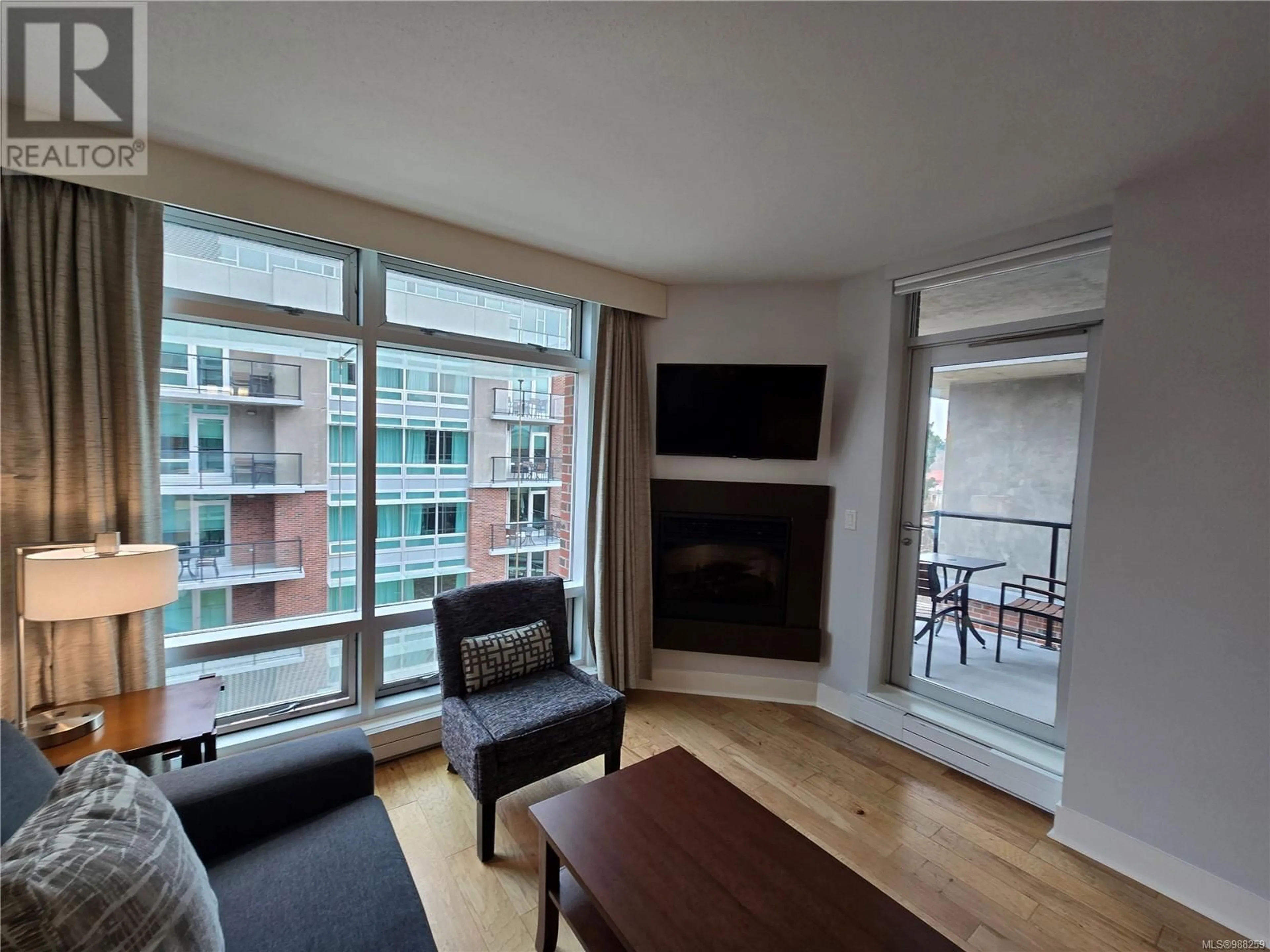 Living room with furniture, wood/laminate floor for A516 810 Humboldt St, Victoria British Columbia V8V5B1