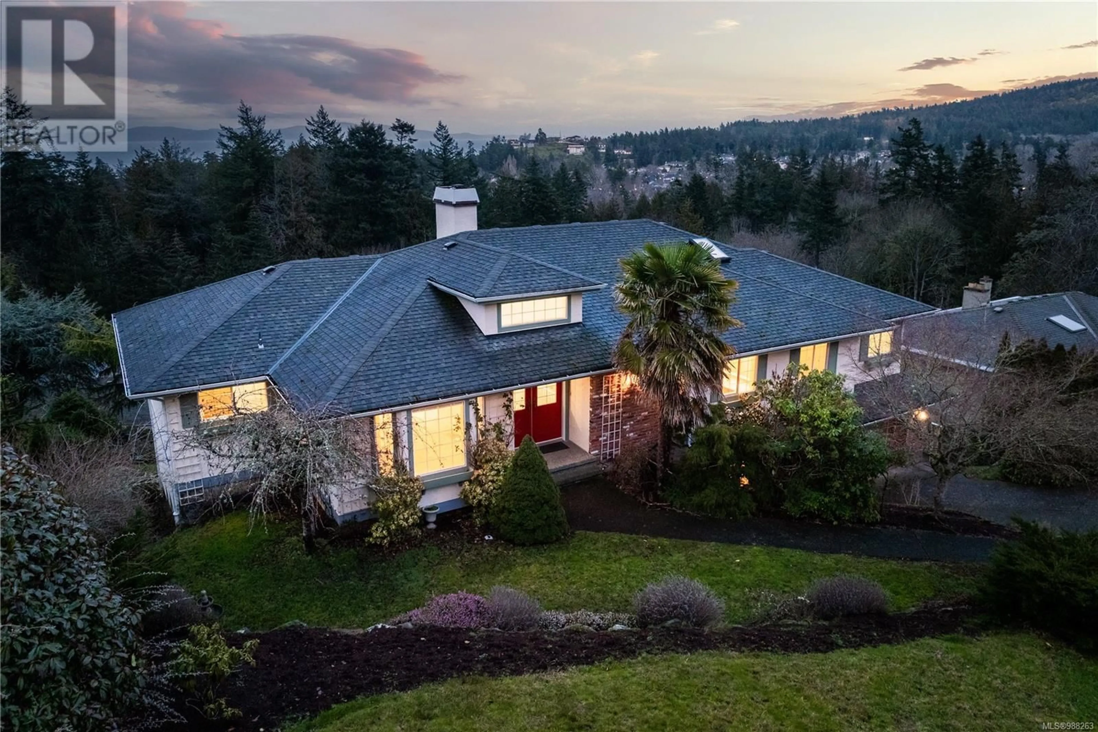 A pic from outside/outdoor area/front of a property/back of a property/a pic from drone, mountain view for 4833 Sea Ridge Dr, Saanich British Columbia V8Y2R7