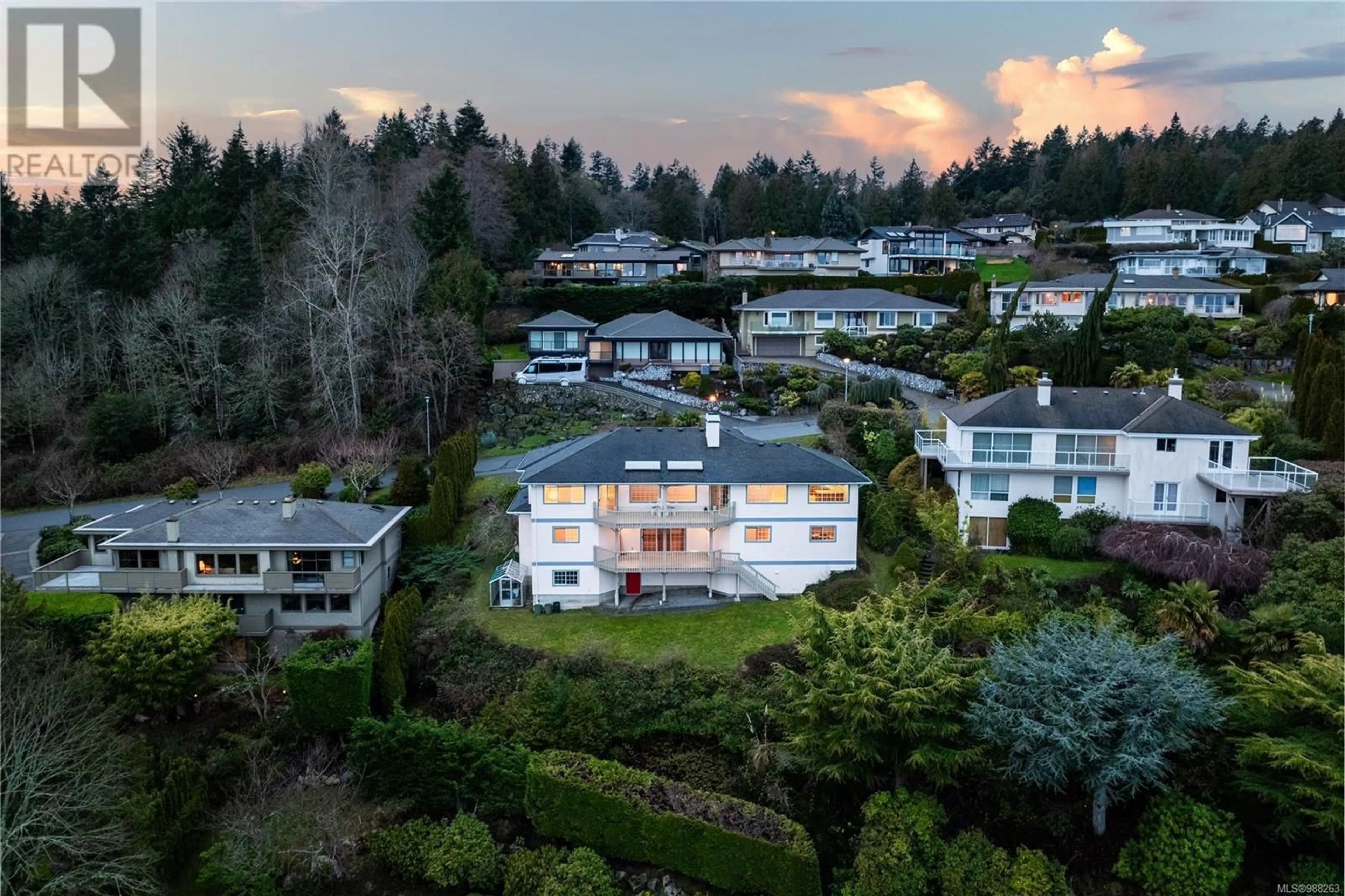 A pic from outside/outdoor area/front of a property/back of a property/a pic from drone, mountain view for 4833 Sea Ridge Dr, Saanich British Columbia V8Y2R7