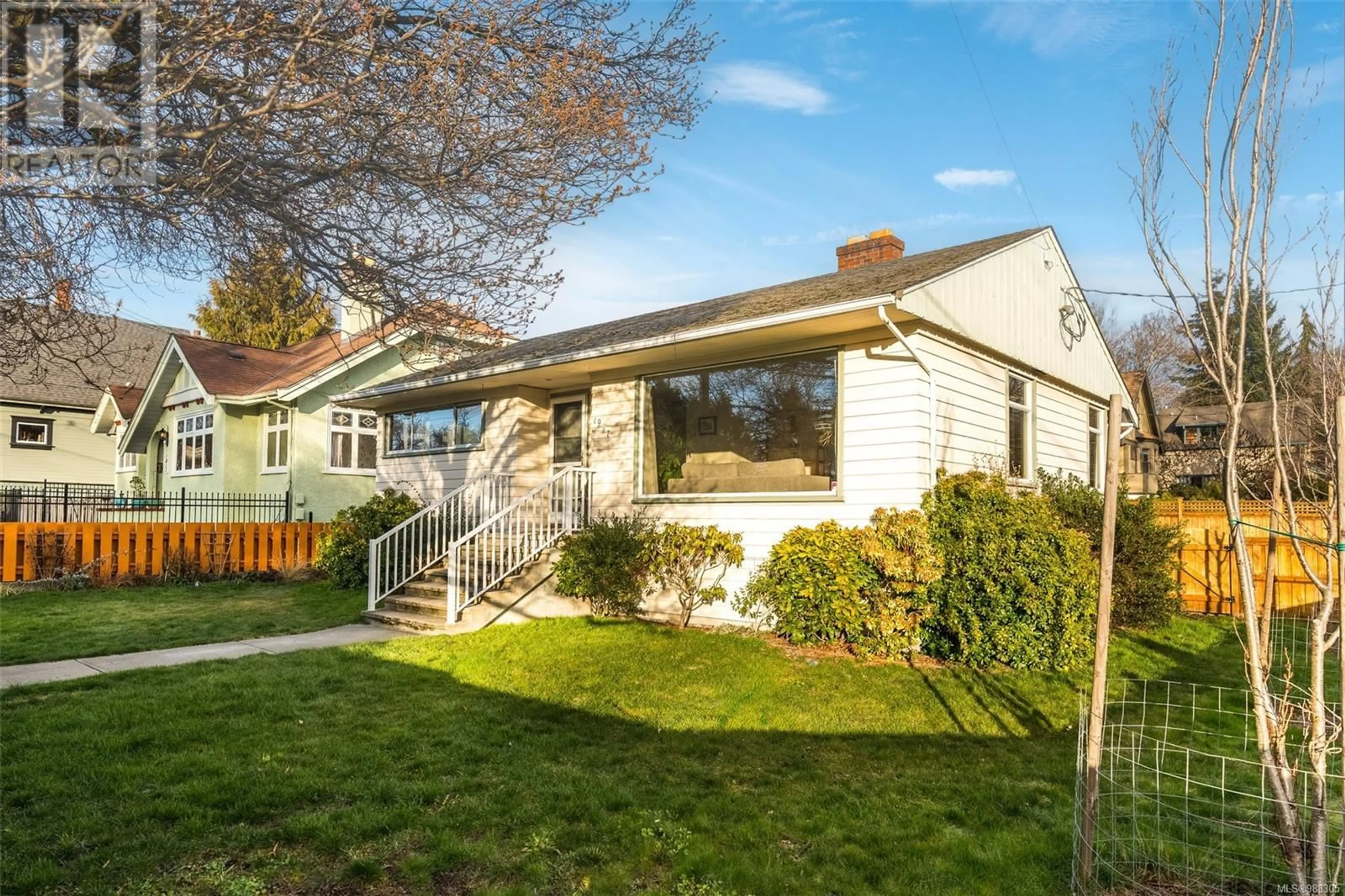 Home with vinyl exterior material, street for 1907 Stanley Ave, Victoria British Columbia V8R3X5