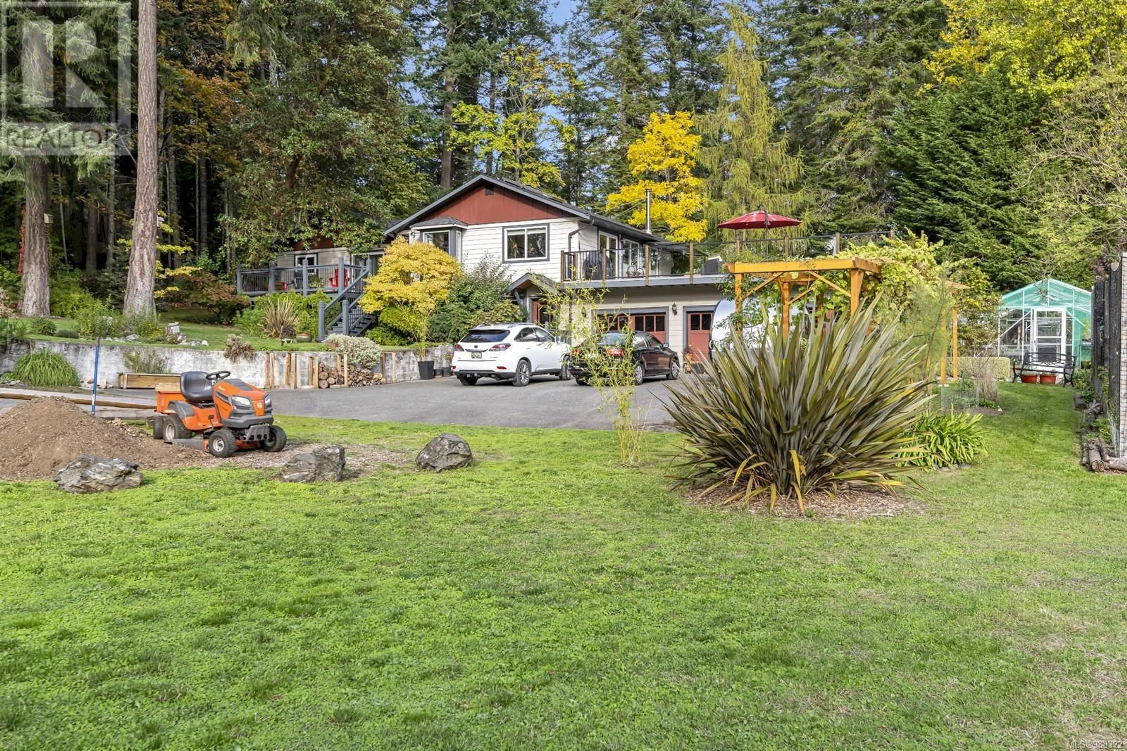 A pic from outside/outdoor area/front of a property/back of a property/a pic from drone, unknown for 395 Conway Rd, Saanich British Columbia V9E2B9