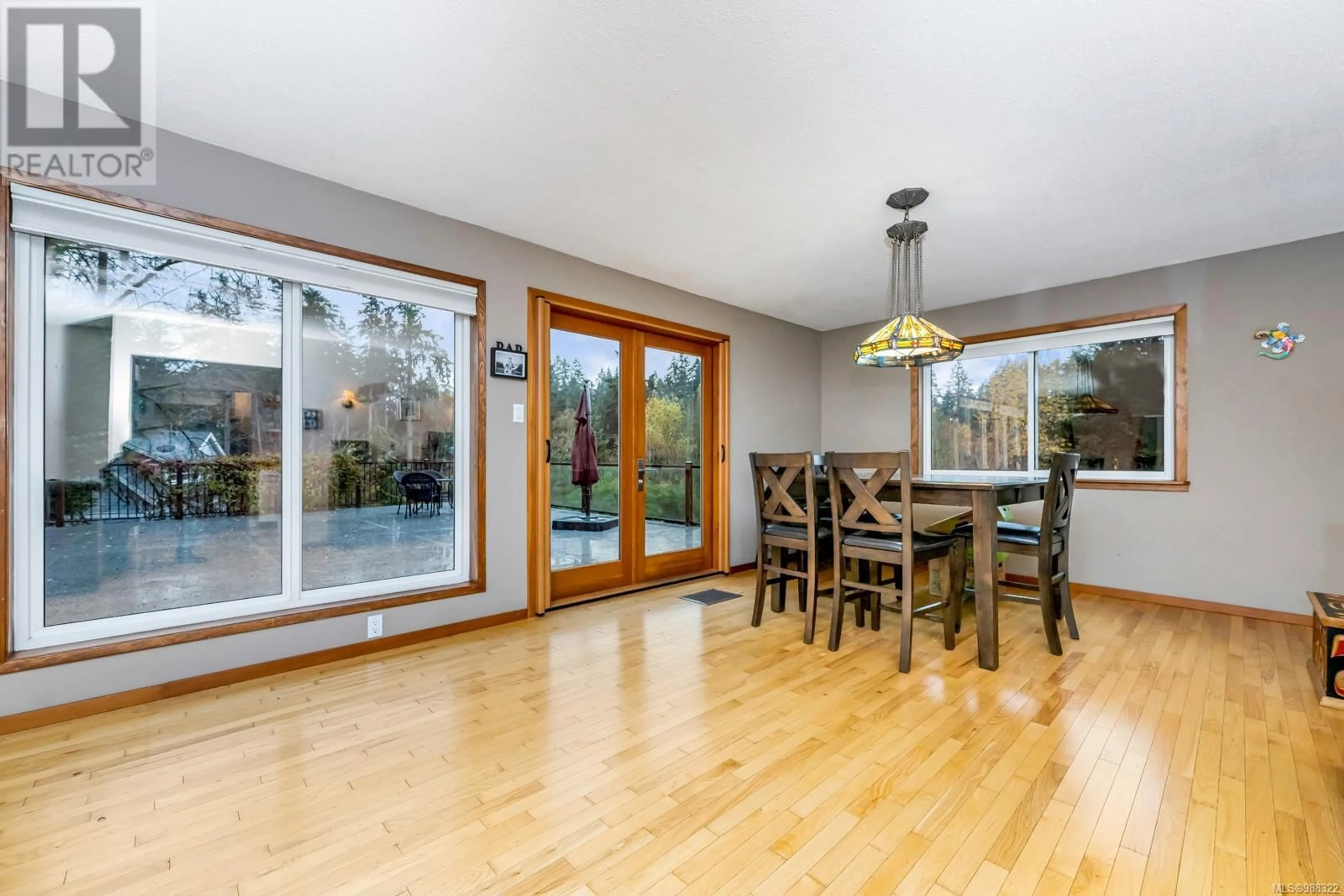 Dining room, wood/laminate floor for 395 Conway Rd, Saanich British Columbia V9E2B9