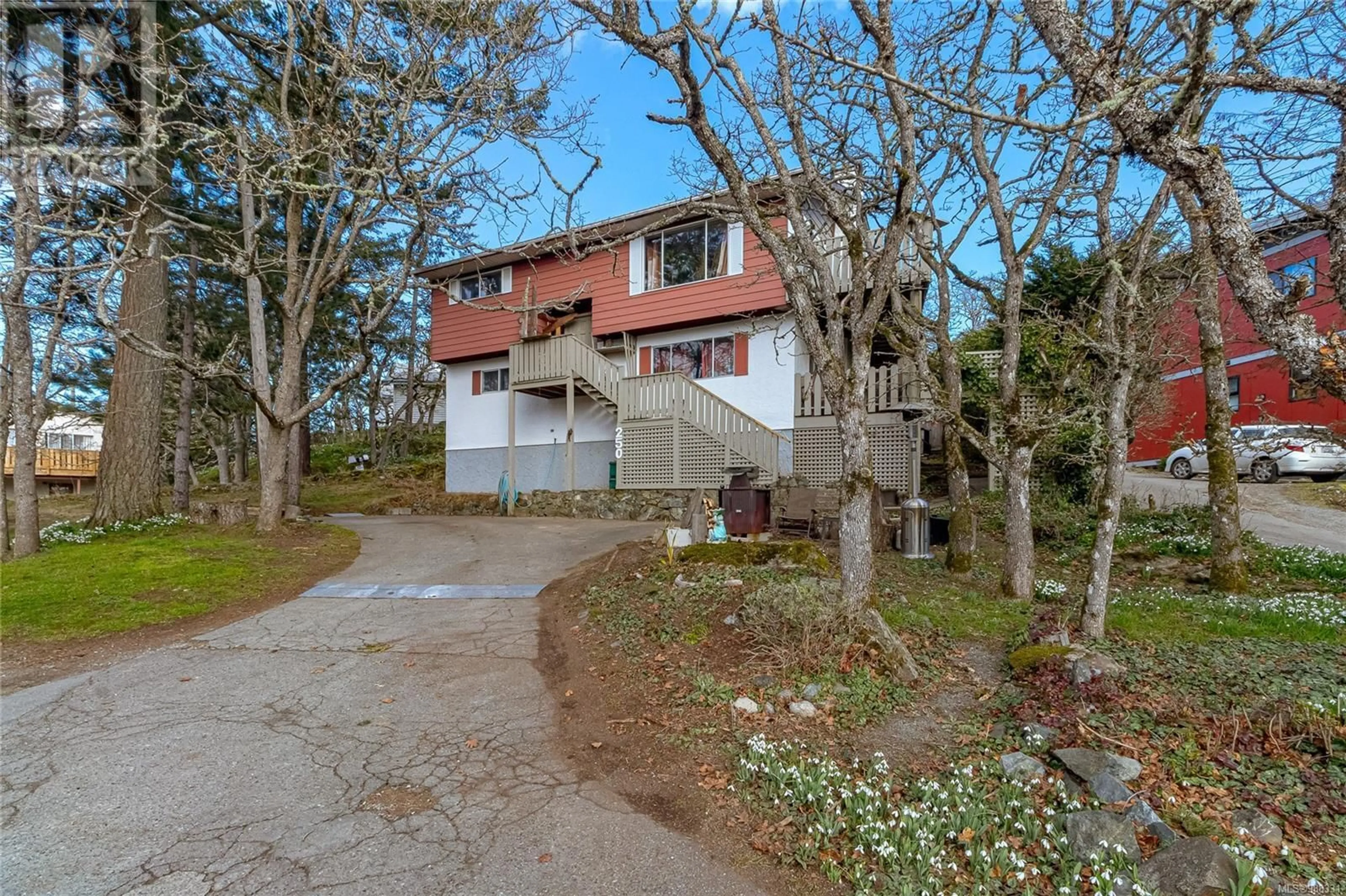 A pic from outside/outdoor area/front of a property/back of a property/a pic from drone, street for 250 Belmont Rd, Colwood British Columbia V9C1B1