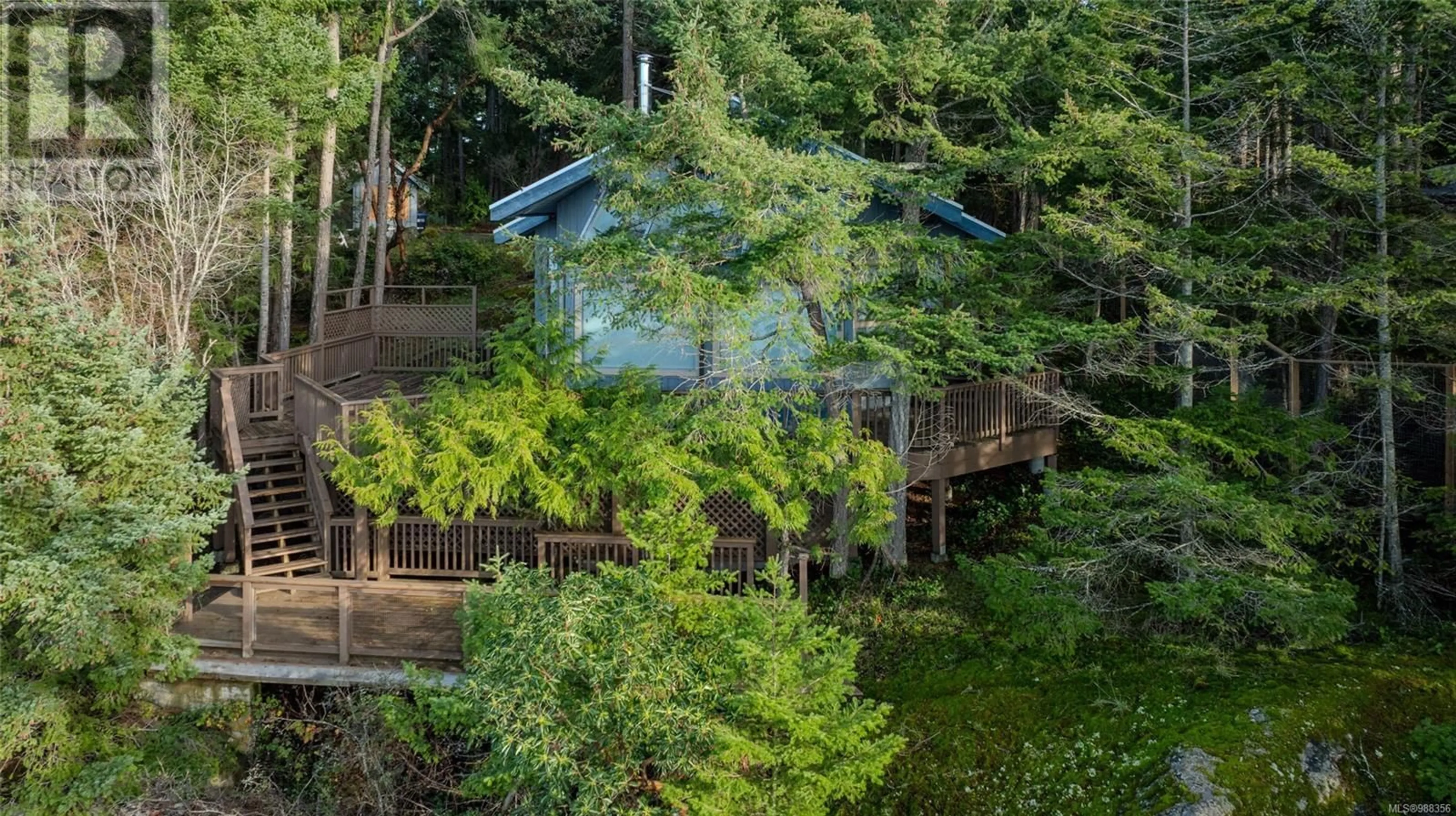 A pic from outside/outdoor area/front of a property/back of a property/a pic from drone, forest/trees view for 851 Canso Rd, Gabriola Island British Columbia V0R1X2