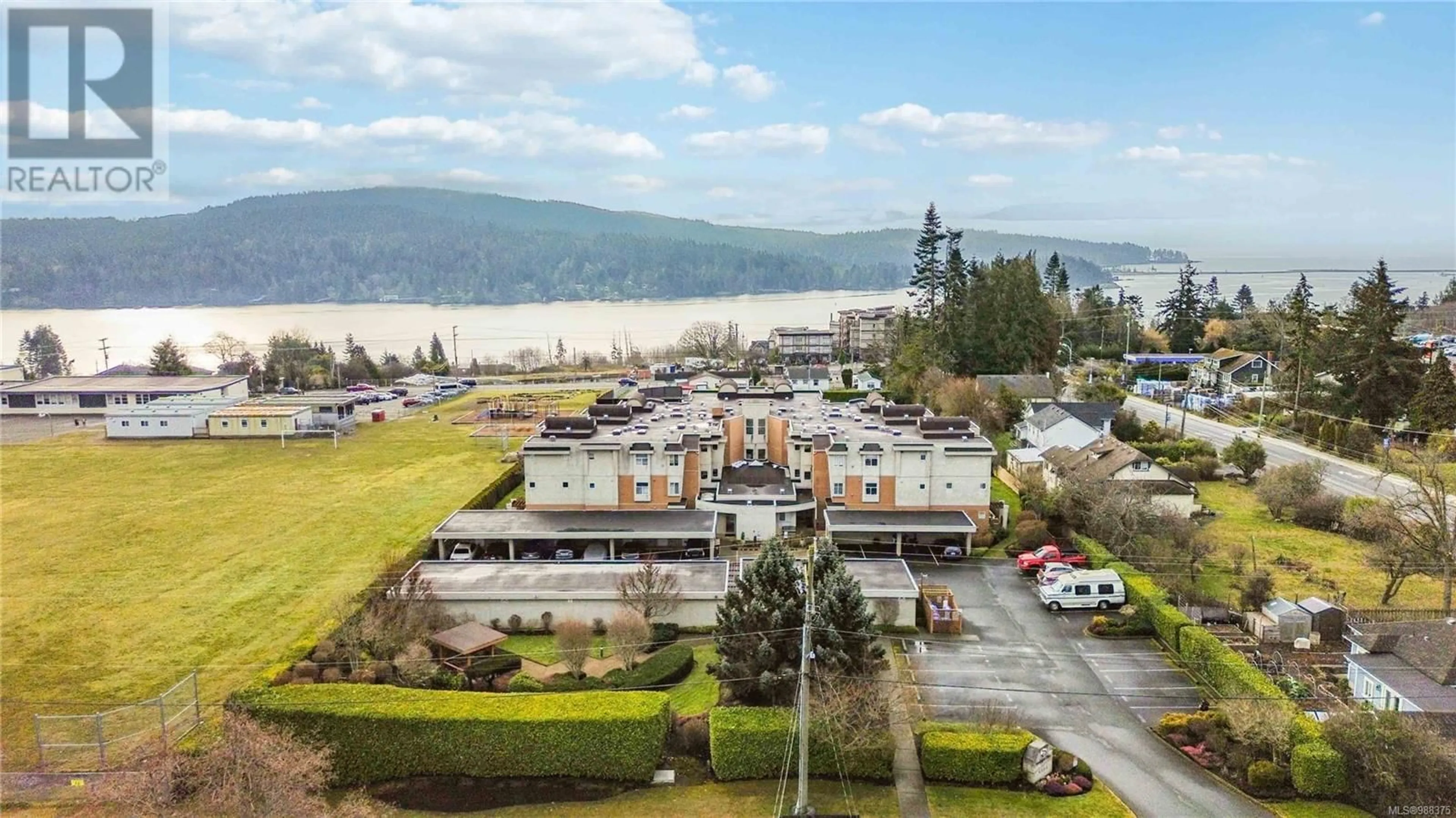 A pic from outside/outdoor area/front of a property/back of a property/a pic from drone, water/lake/river/ocean view for 304 6585 Country Rd, Sooke British Columbia V9Z0W5