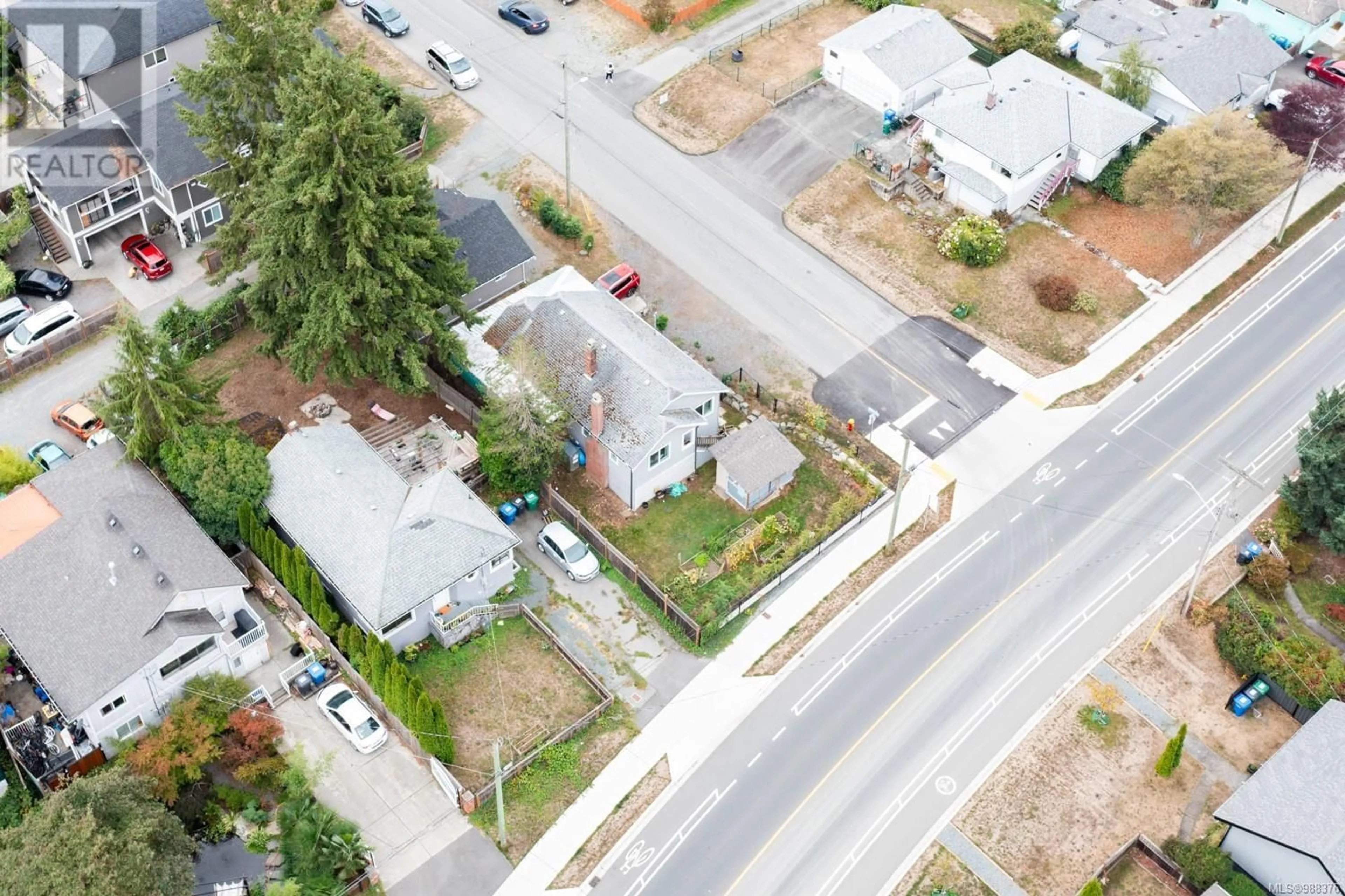 A pic from outside/outdoor area/front of a property/back of a property/a pic from drone, street for 15 Fourth St, Nanaimo British Columbia V9R1S6