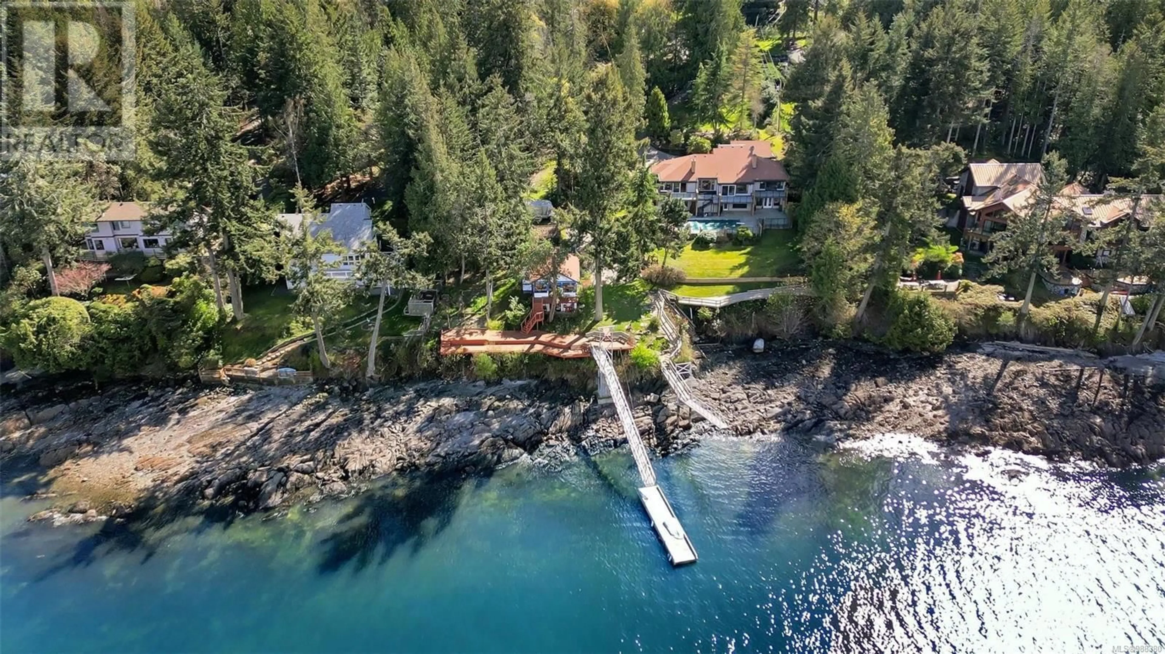 A pic from outside/outdoor area/front of a property/back of a property/a pic from drone, water/lake/river/ocean view for 1032/1034 Lands End Rd, North Saanich British Columbia V8L5L3