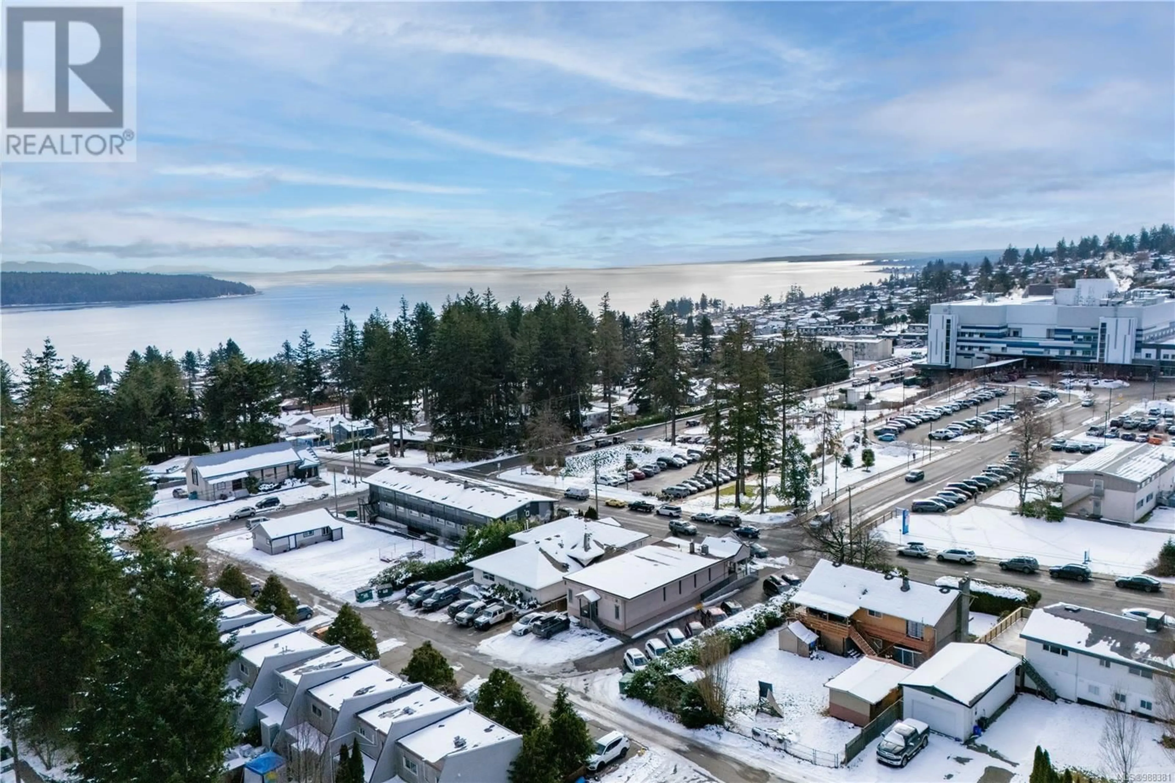A pic from outside/outdoor area/front of a property/back of a property/a pic from drone, water/lake/river/ocean view for 307 - 282 BIRCH STREET, Campbell River British Columbia V9W2S3