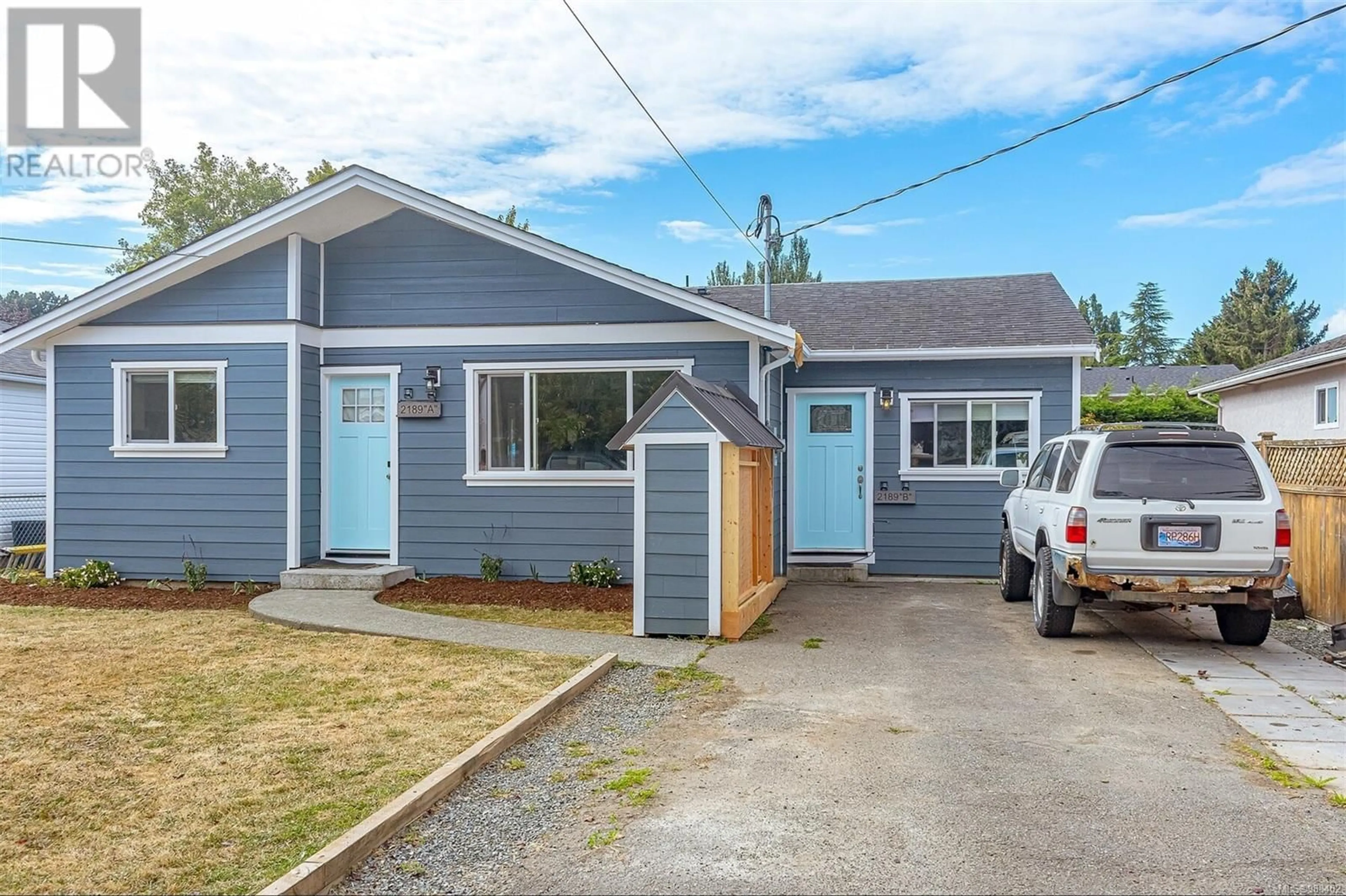 Home with vinyl exterior material, street for 2189A &2189B Amelia Ave, Sidney British Columbia V8L2H5