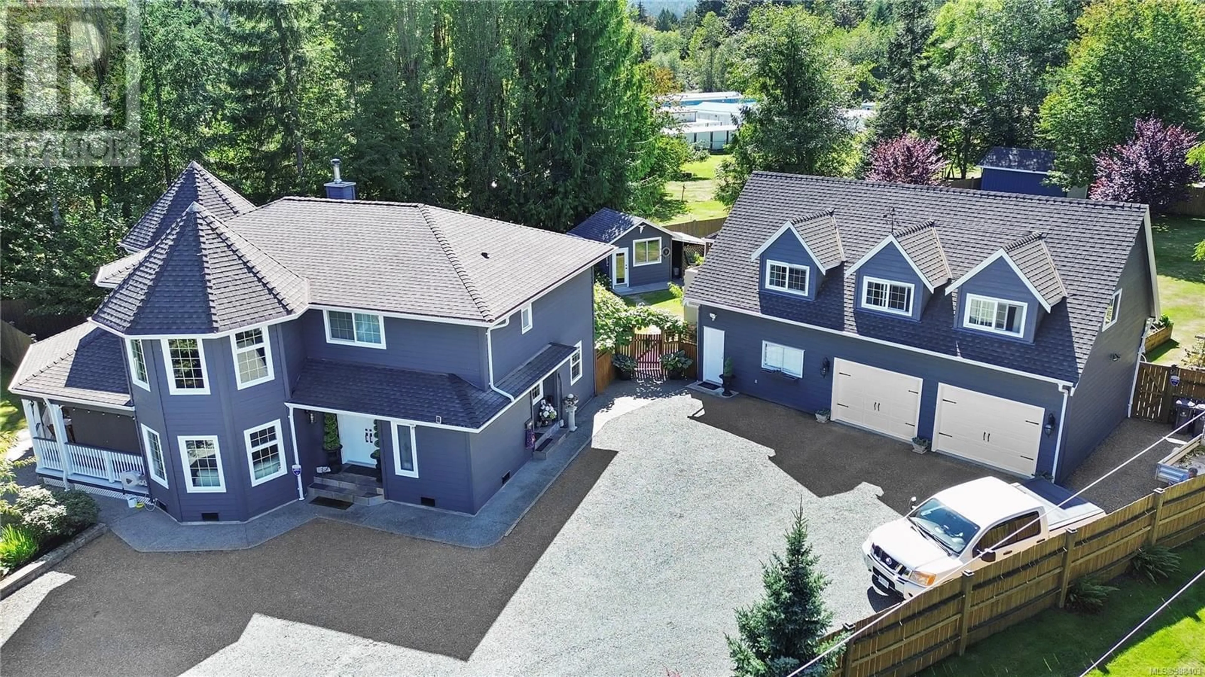 A pic from outside/outdoor area/front of a property/back of a property/a pic from drone, street for 10890 Chemainus Rd, Ladysmith British Columbia V9G2A4