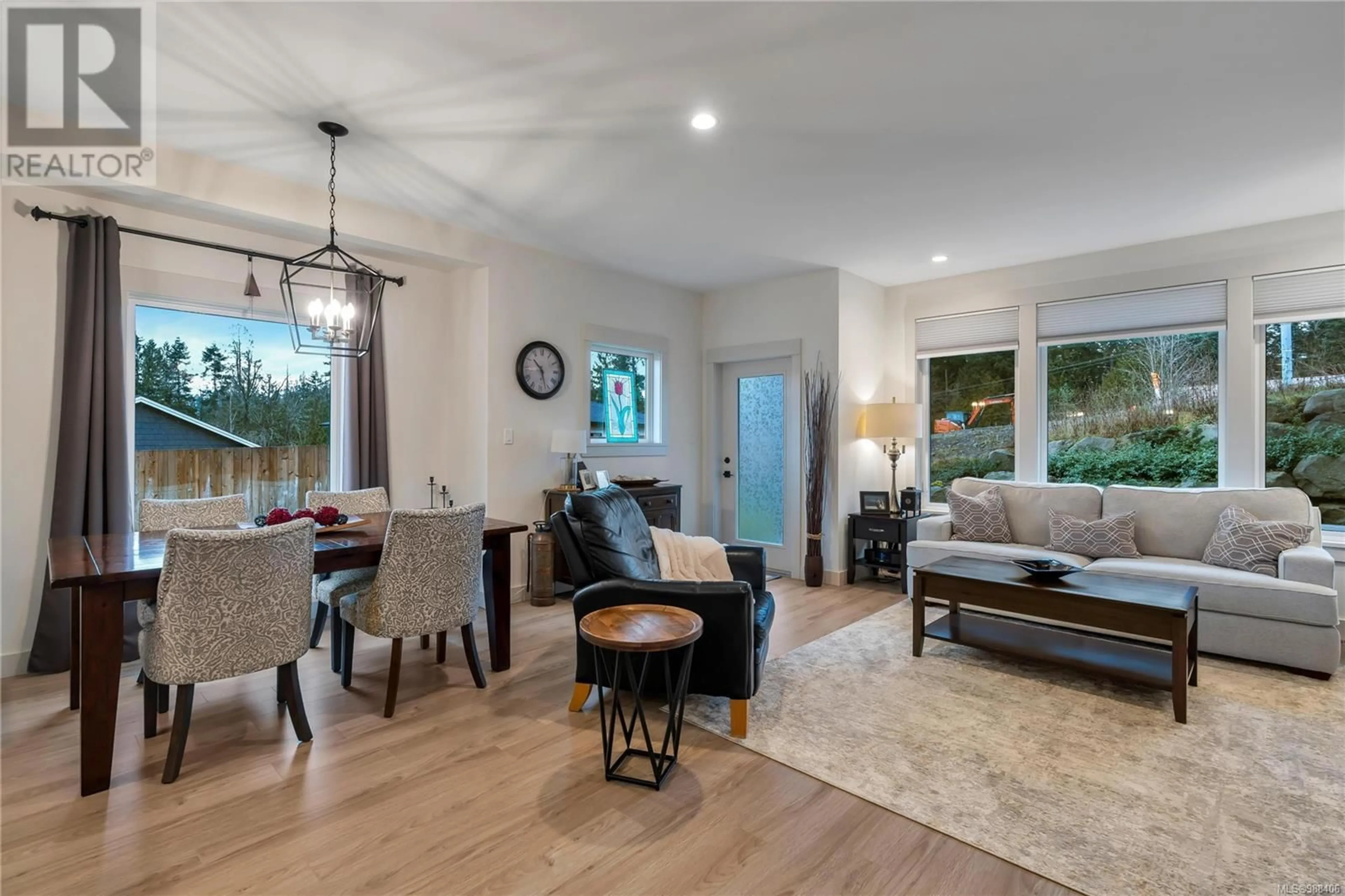 Living room with furniture, wood/laminate floor for 10 420 Cook St, Ladysmith British Columbia V9G1P8