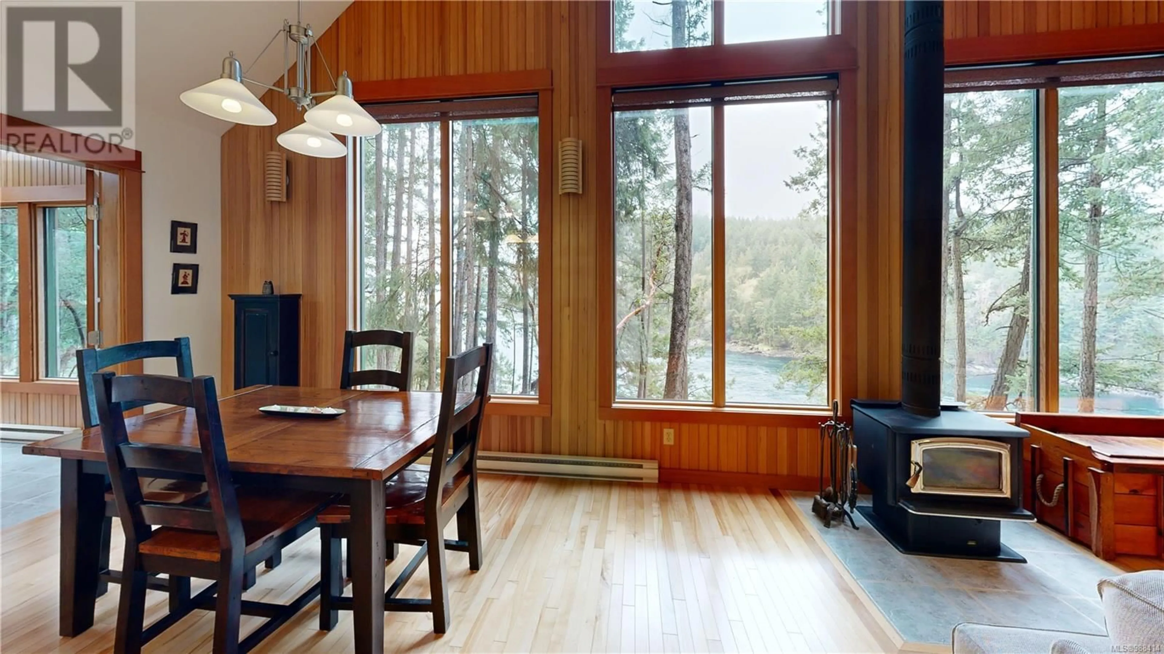 Dining room, wood/laminate floor for 211 Halibut Hill, Mudge Island British Columbia V0R1X6