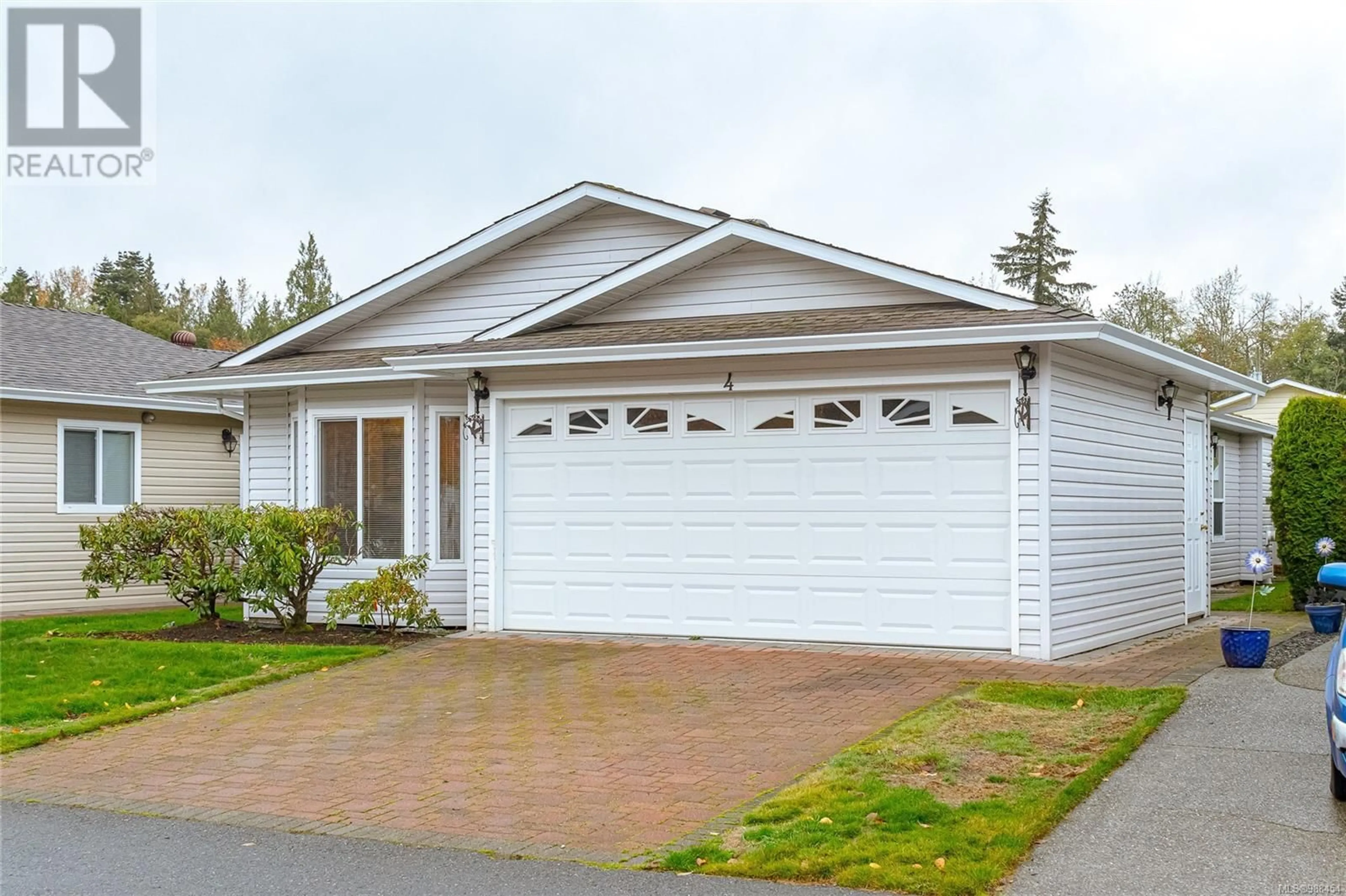 Home with vinyl exterior material, street for 4 7570 Tetayut Rd, Central Saanich British Columbia V8M2H4