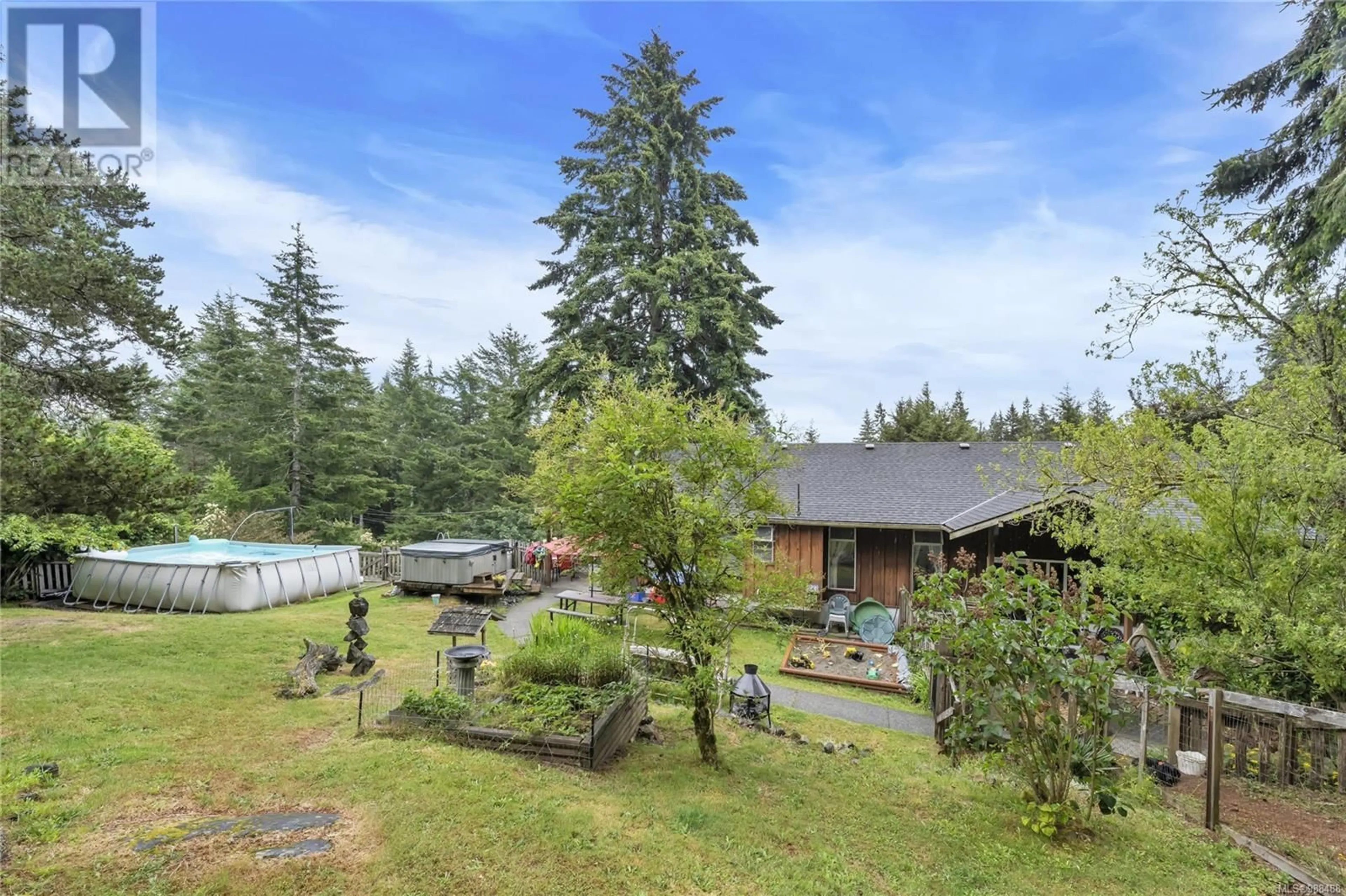 A pic from outside/outdoor area/front of a property/back of a property/a pic from drone, forest/trees view for 3765 Otter Point Rd, Sooke British Columbia V9Z0K1