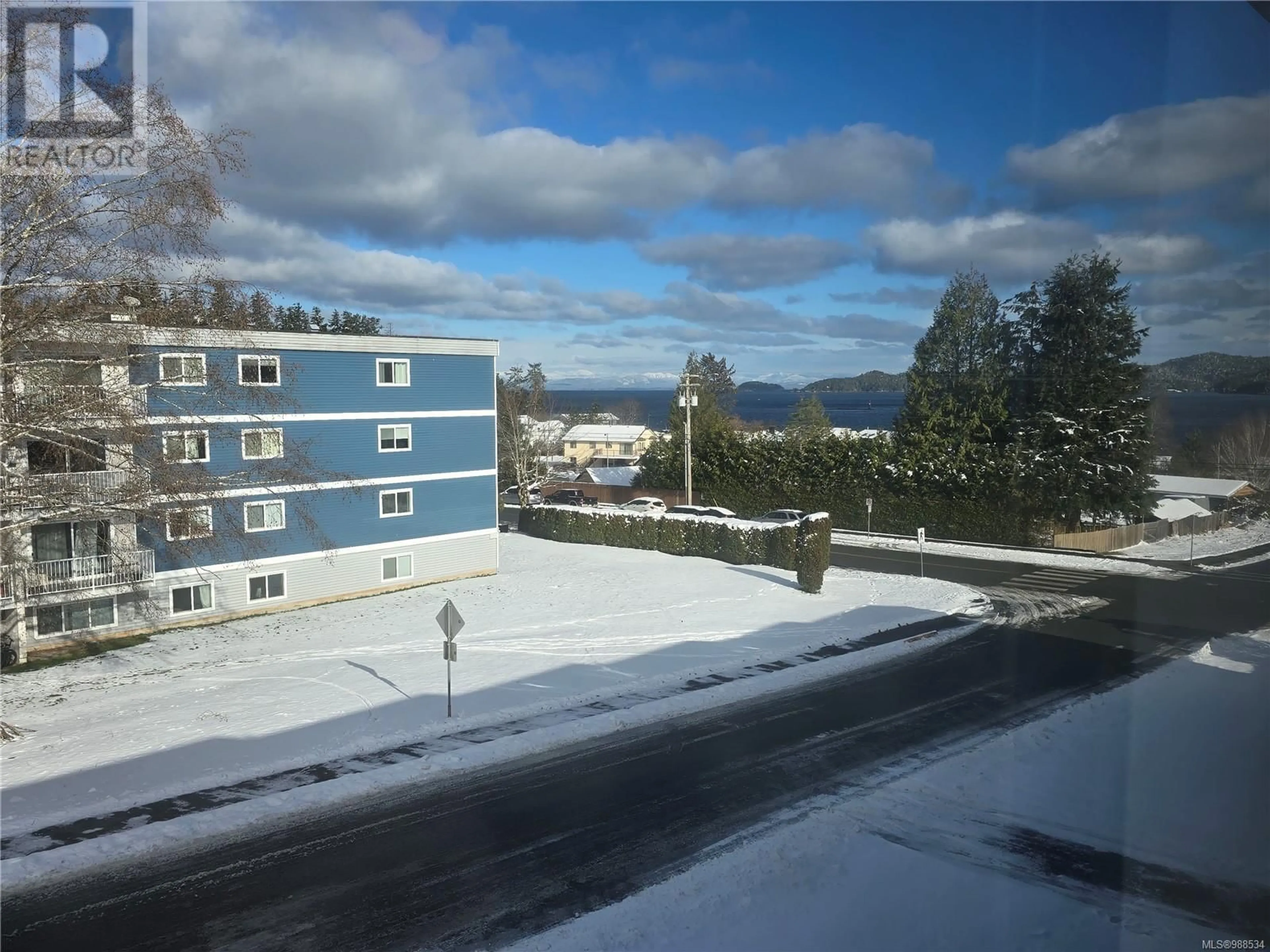 A pic from outside/outdoor area/front of a property/back of a property/a pic from drone, city buildings view from balcony for 11 8805 Central St, Port Hardy British Columbia V0N2P0