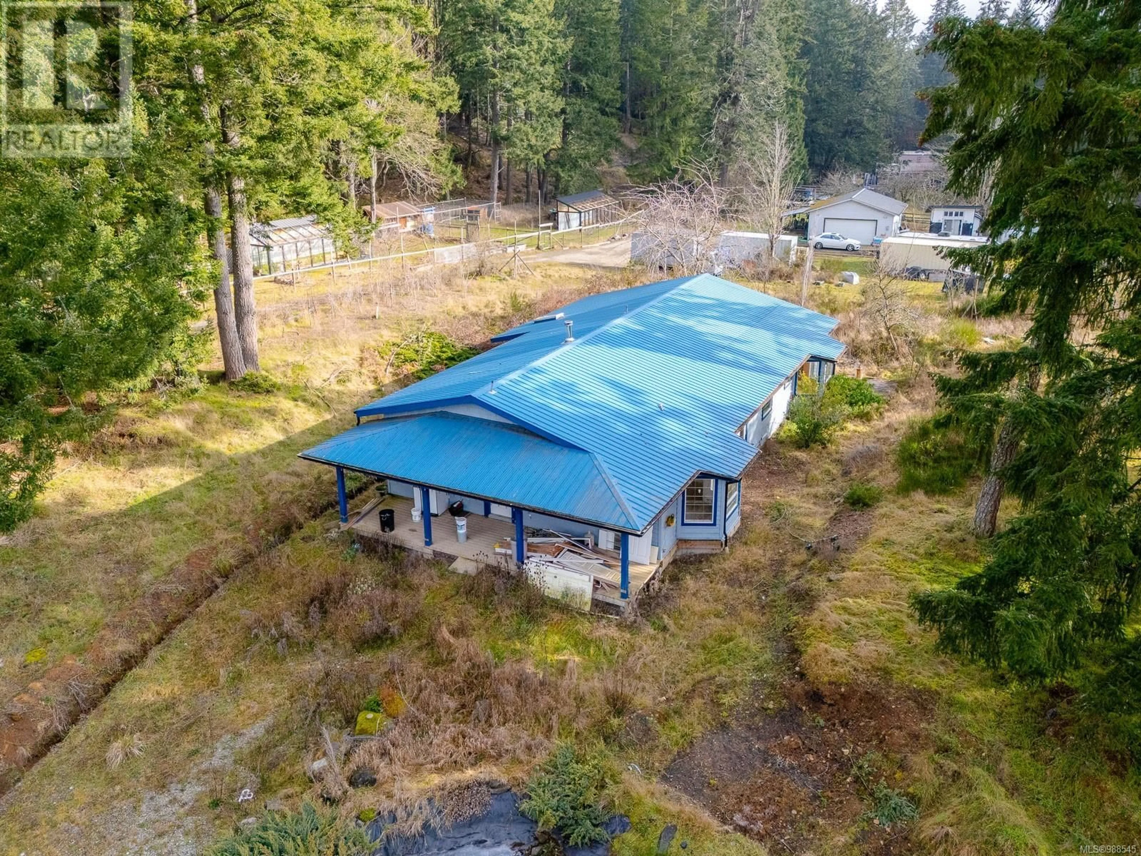 A pic from outside/outdoor area/front of a property/back of a property/a pic from drone, unknown for 328 Blackburn Rd, Salt Spring British Columbia V8K2B8