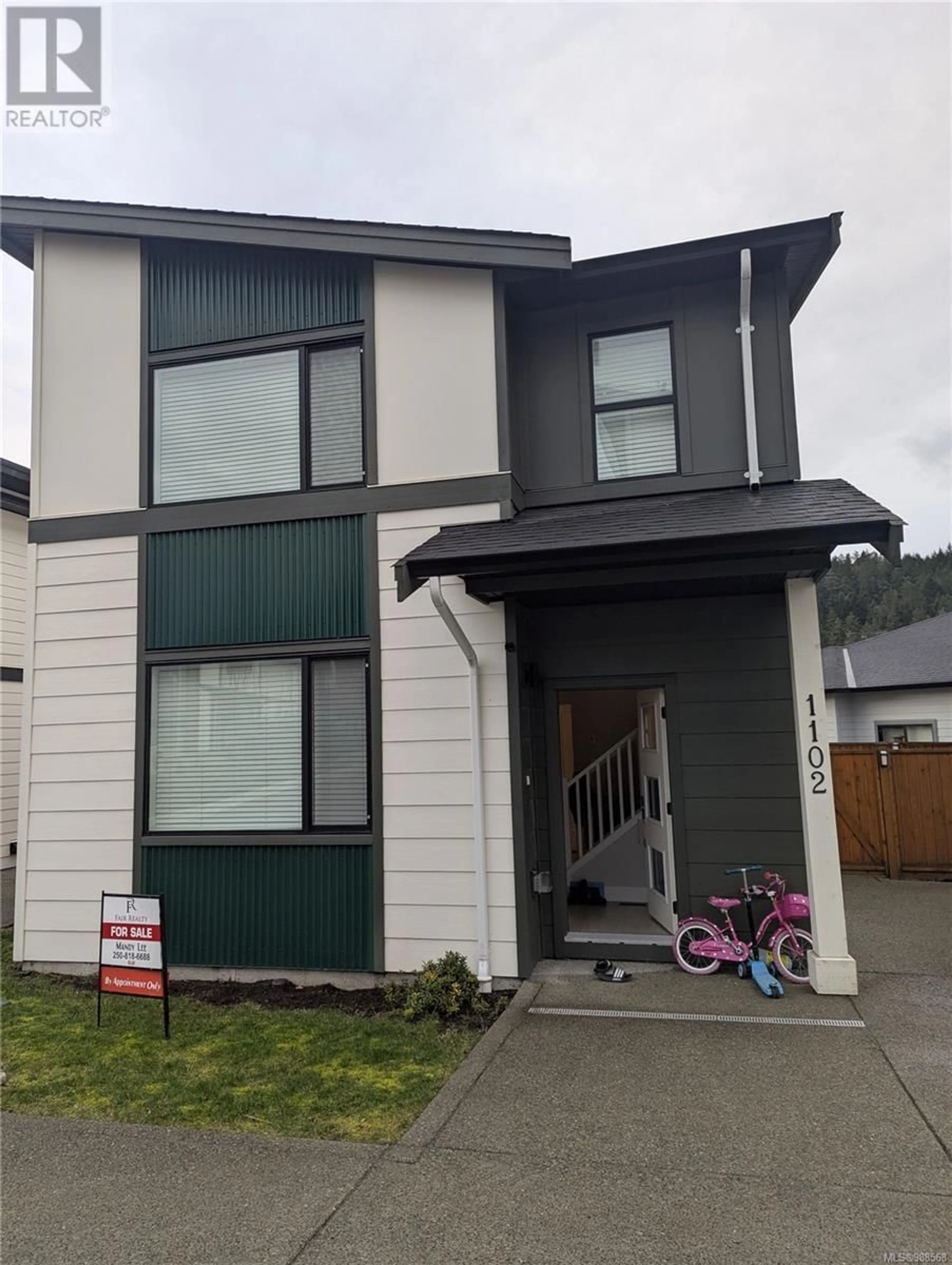 Home with vinyl exterior material, street for 1102 Lira Cres, Langford British Columbia V9B3R6