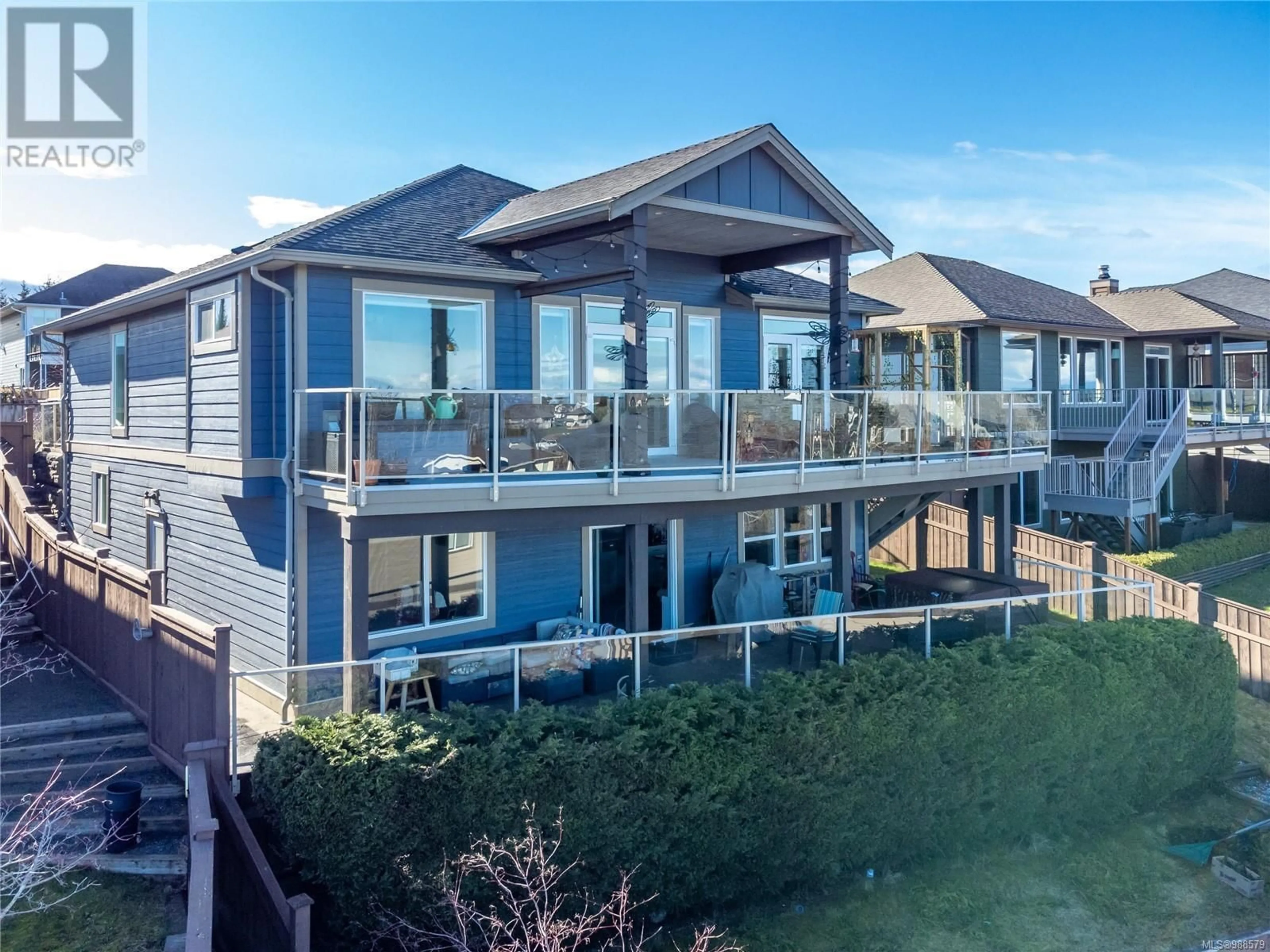 A pic from outside/outdoor area/front of a property/back of a property/a pic from drone, water/lake/river/ocean view for 672 PACIFIC HEIGHTS LANE, Campbell River British Columbia V9H0A6