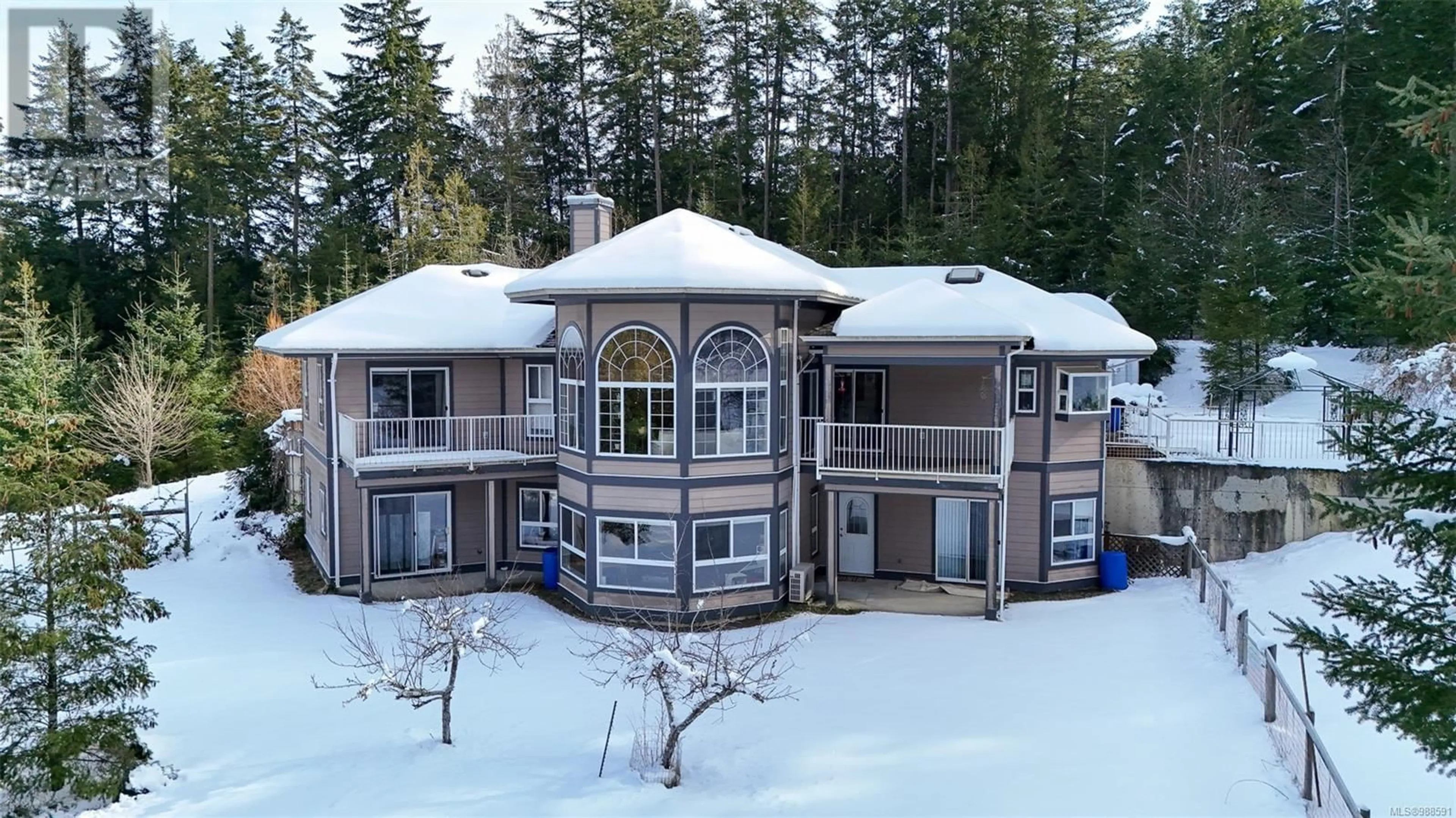 A pic from outside/outdoor area/front of a property/back of a property/a pic from drone, unknown for 2500 Brunton Rd, Shawnigan Lake British Columbia V0R2W0