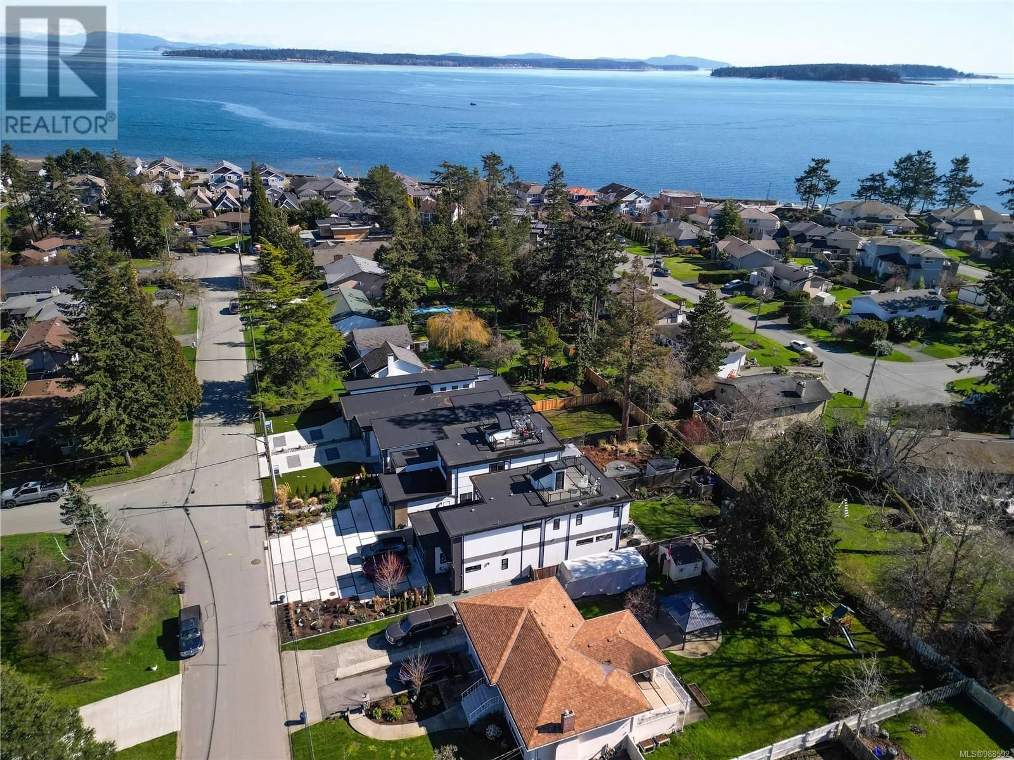 A pic from outside/outdoor area/front of a property/back of a property/a pic from drone, water/lake/river/ocean view for 9499 MARYLAND DRIVE, Sidney British Columbia V8L2R7