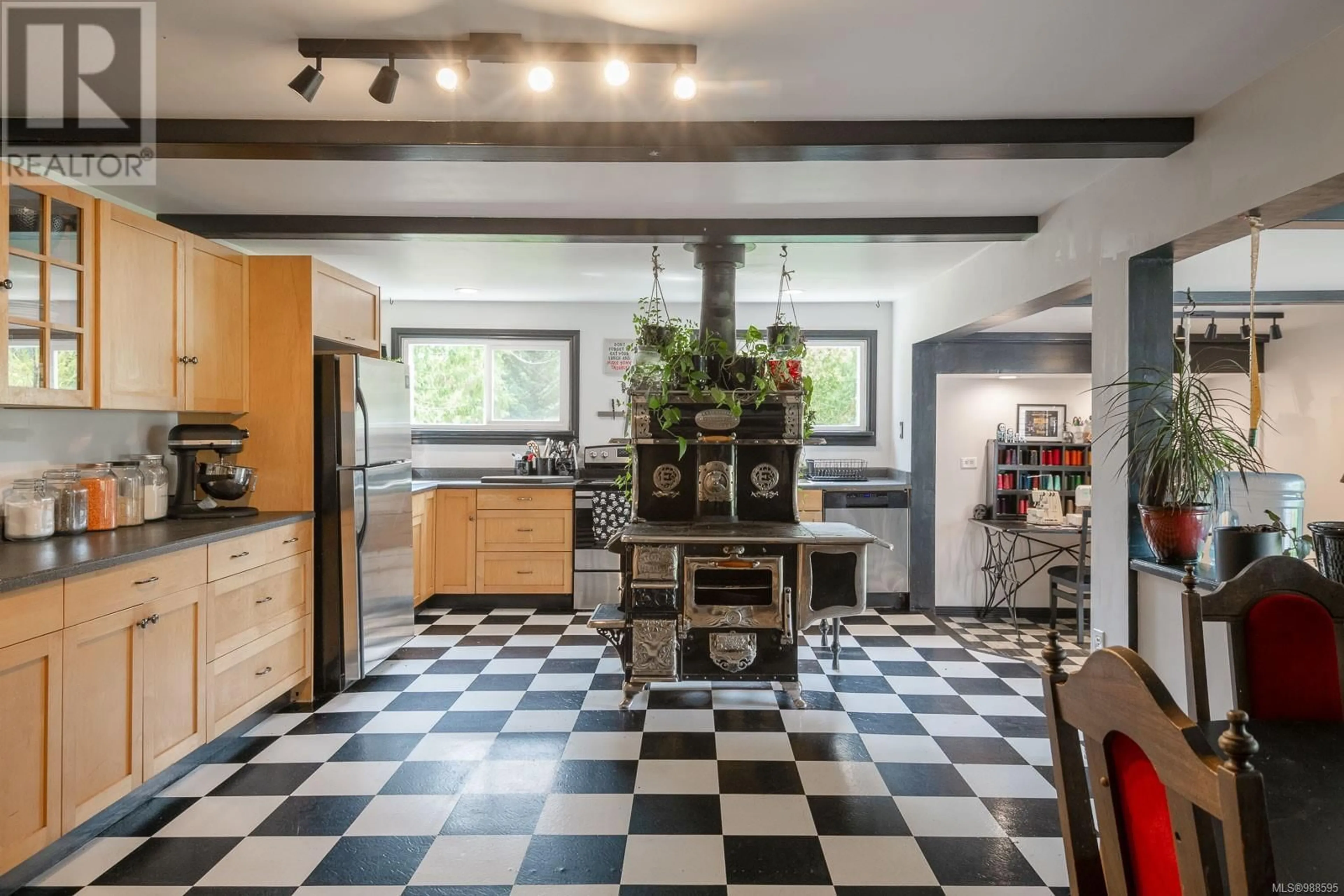 Open concept kitchen, ceramic/tile floor for 8590 Bland Rd, Port Alberni British Columbia V9Y8N6