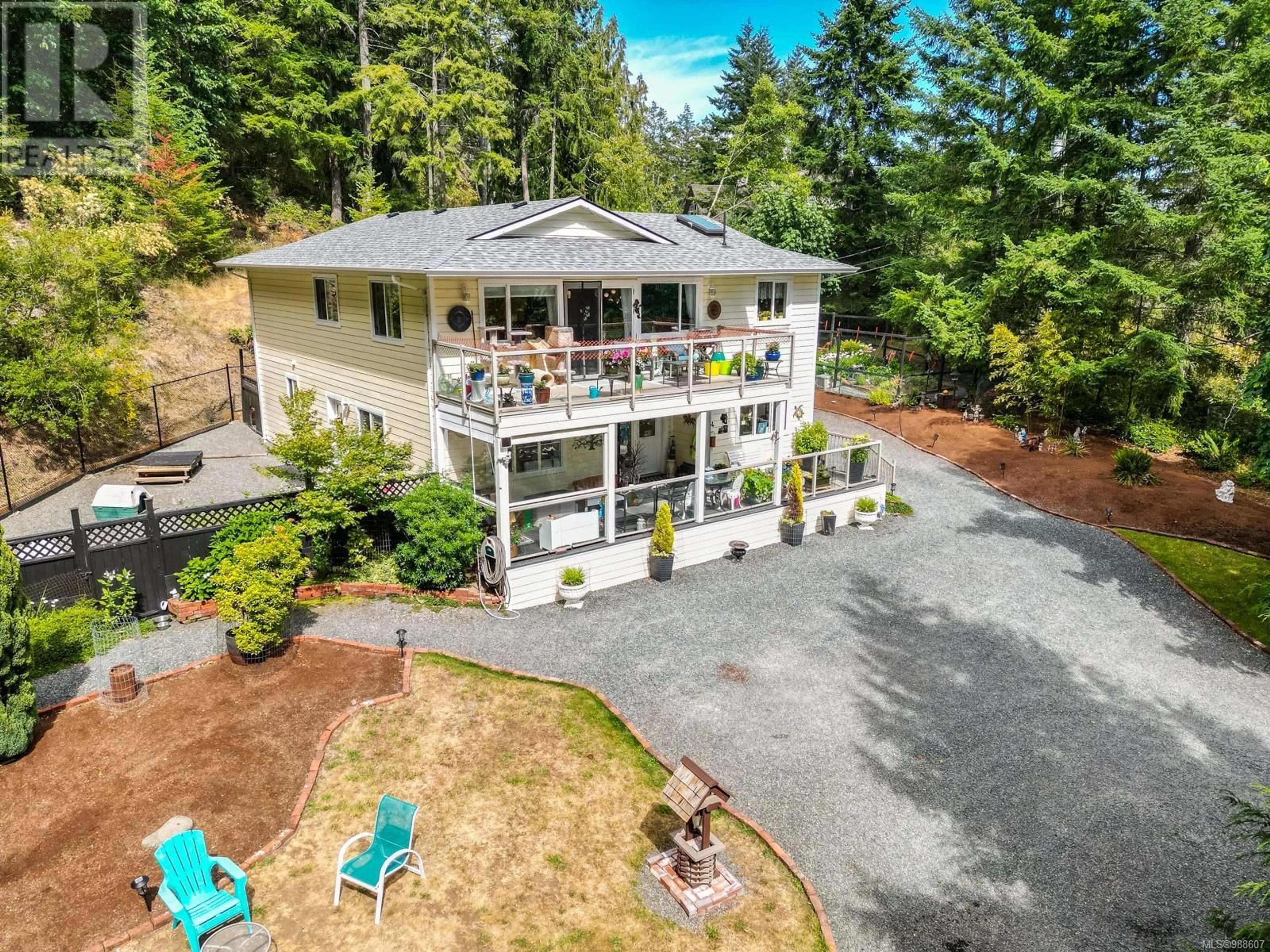 A pic from outside/outdoor area/front of a property/back of a property/a pic from drone, water/lake/river/ocean view for 1477 Kangaroo Rd, Metchosin British Columbia V9C4C6