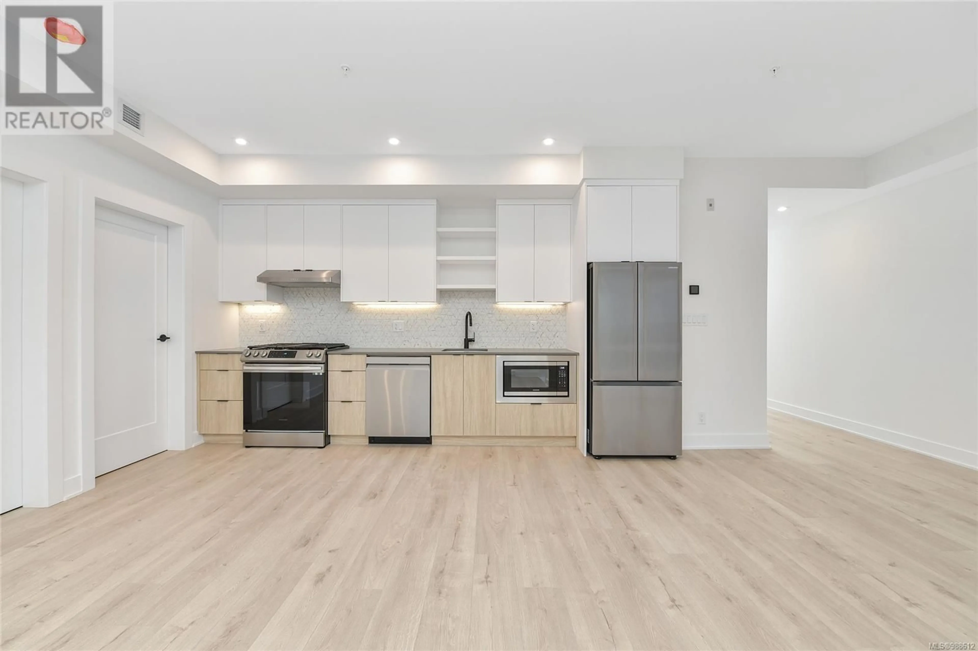 Open concept kitchen, wood/laminate floor for 204 - 1114 SAMAR CRESCENT, Langford British Columbia V9B3R6