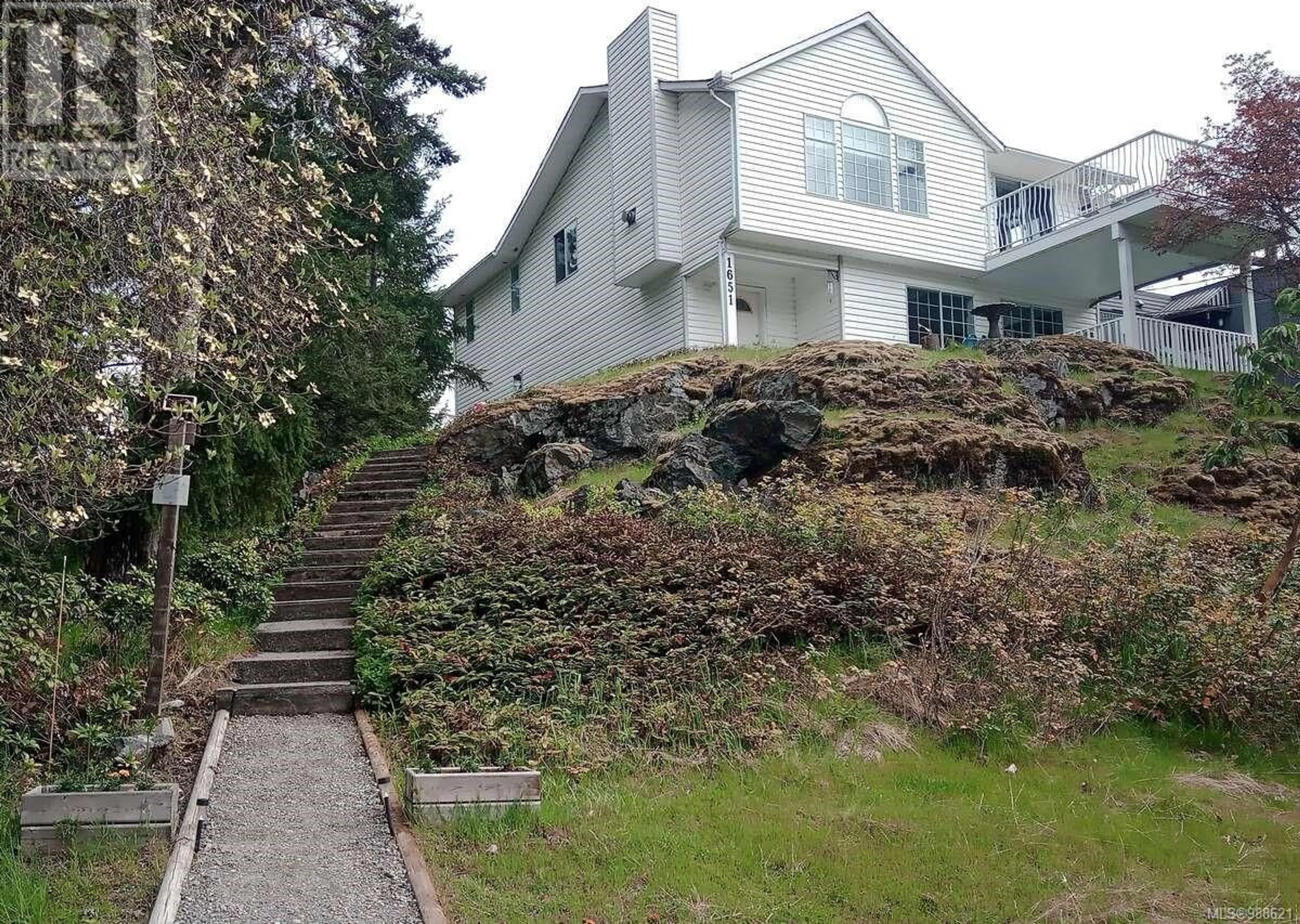 A pic from outside/outdoor area/front of a property/back of a property/a pic from drone, unknown for 1651 Sheriff Way, Nanaimo British Columbia V9T4A4