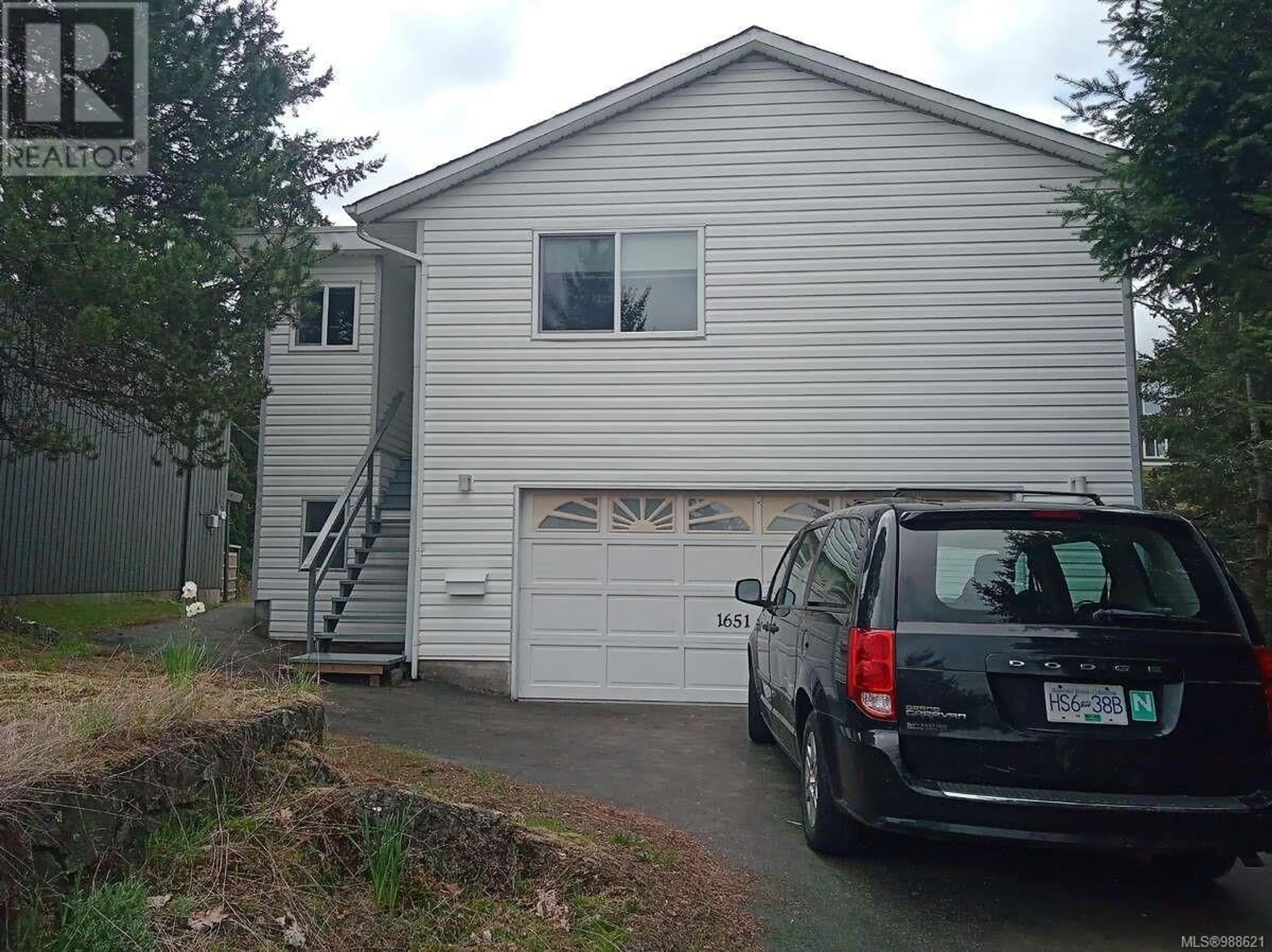 Home with vinyl exterior material, street for 1651 Sheriff Way, Nanaimo British Columbia V9T4A4