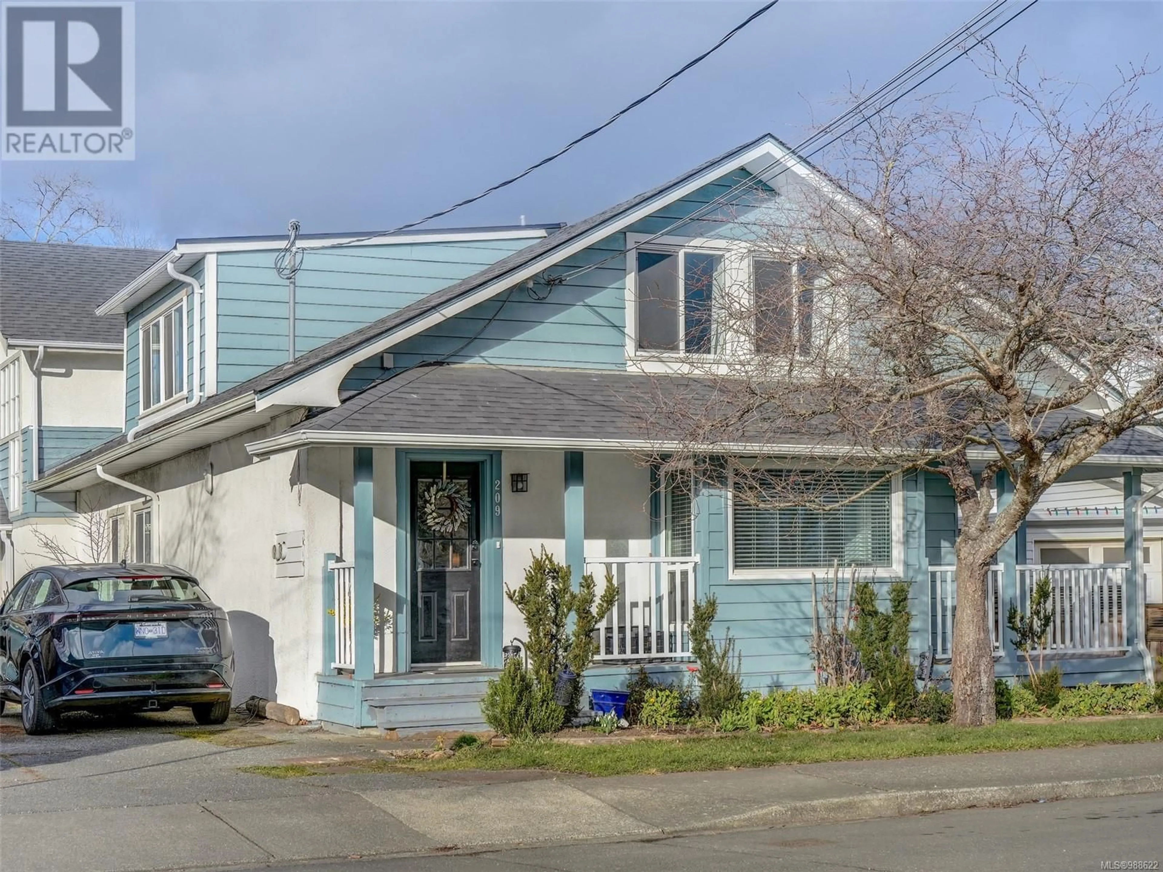 Home with vinyl exterior material, street for 209 Henry St, Victoria British Columbia V9A3H8