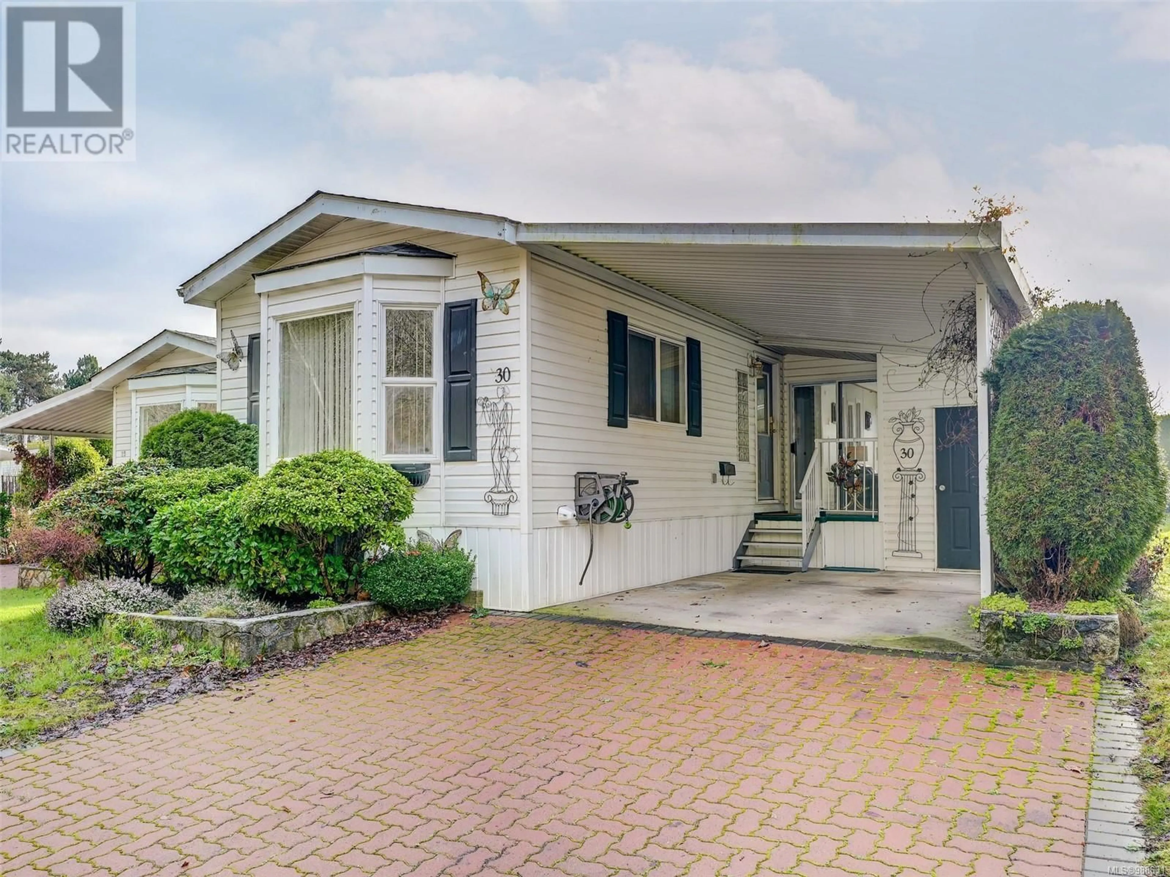 Home with vinyl exterior material, street for 30 7401 Central Saanich Rd, Central Saanich British Columbia V8M2B5