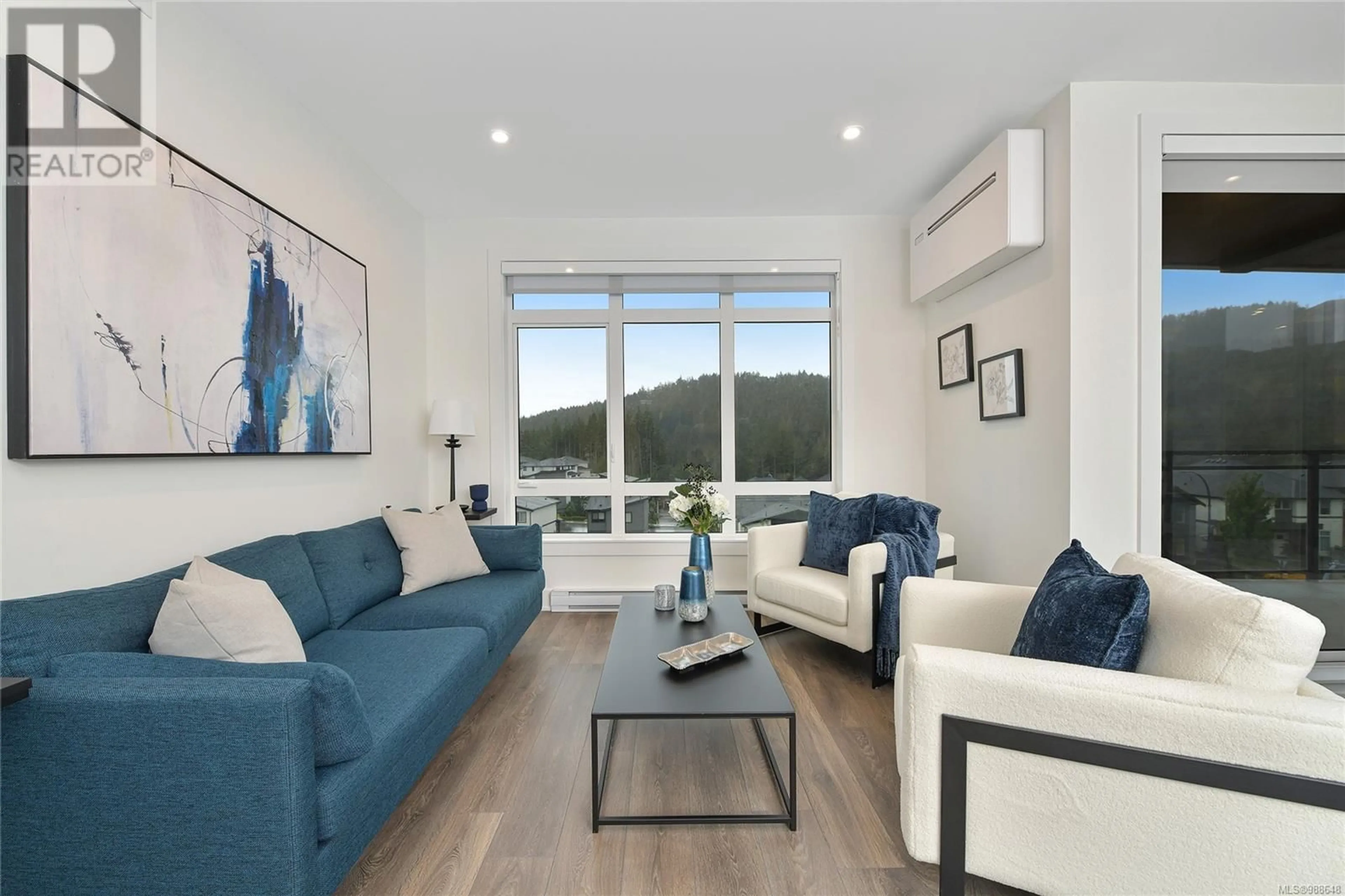 Living room with furniture, wood/laminate floor for 302 1114 Samar Cres, Langford British Columbia V9B7C5