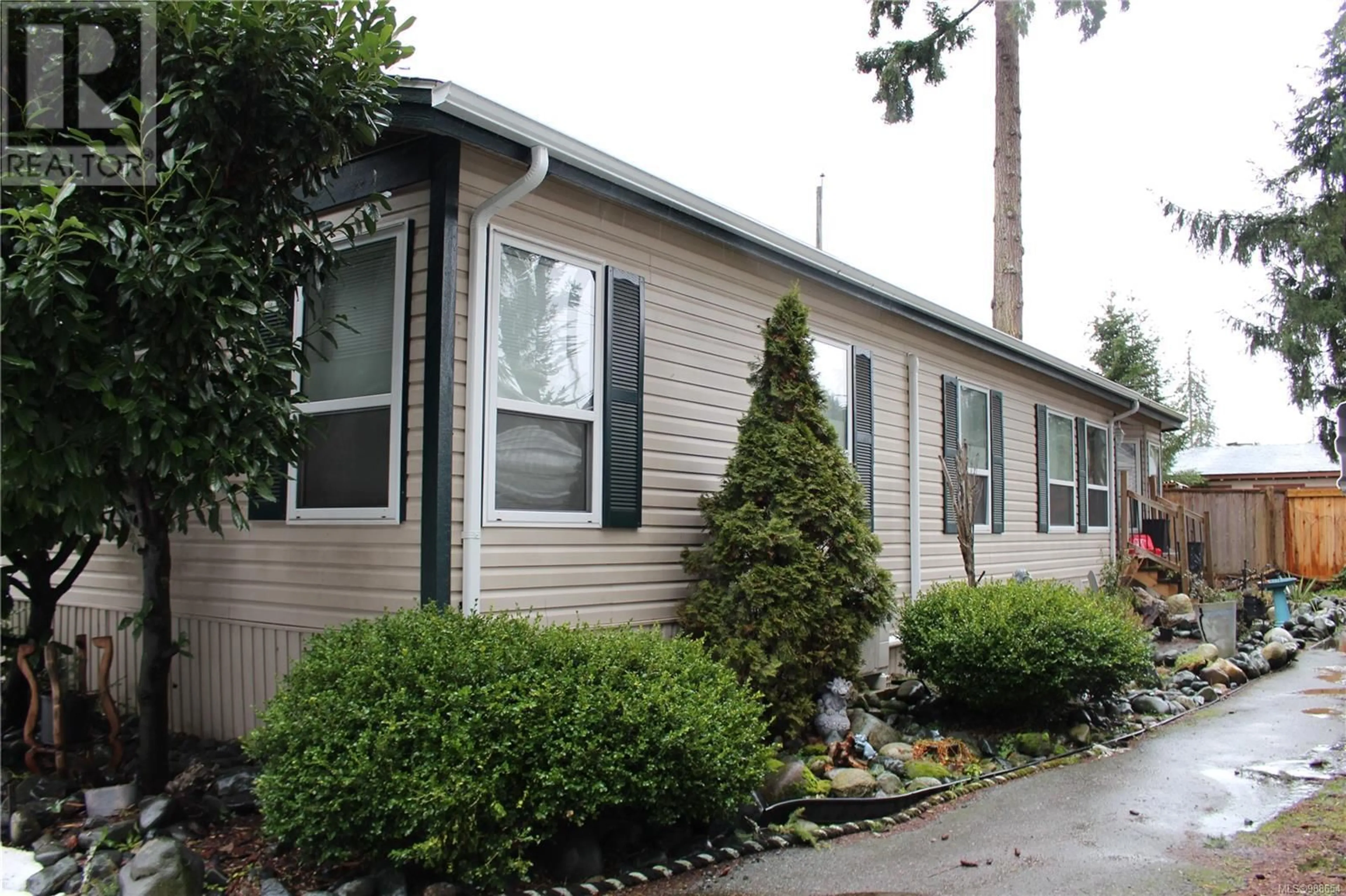 Home with vinyl exterior material, street for 129 1736 Timberlands Rd, Nanaimo British Columbia V9G1K3