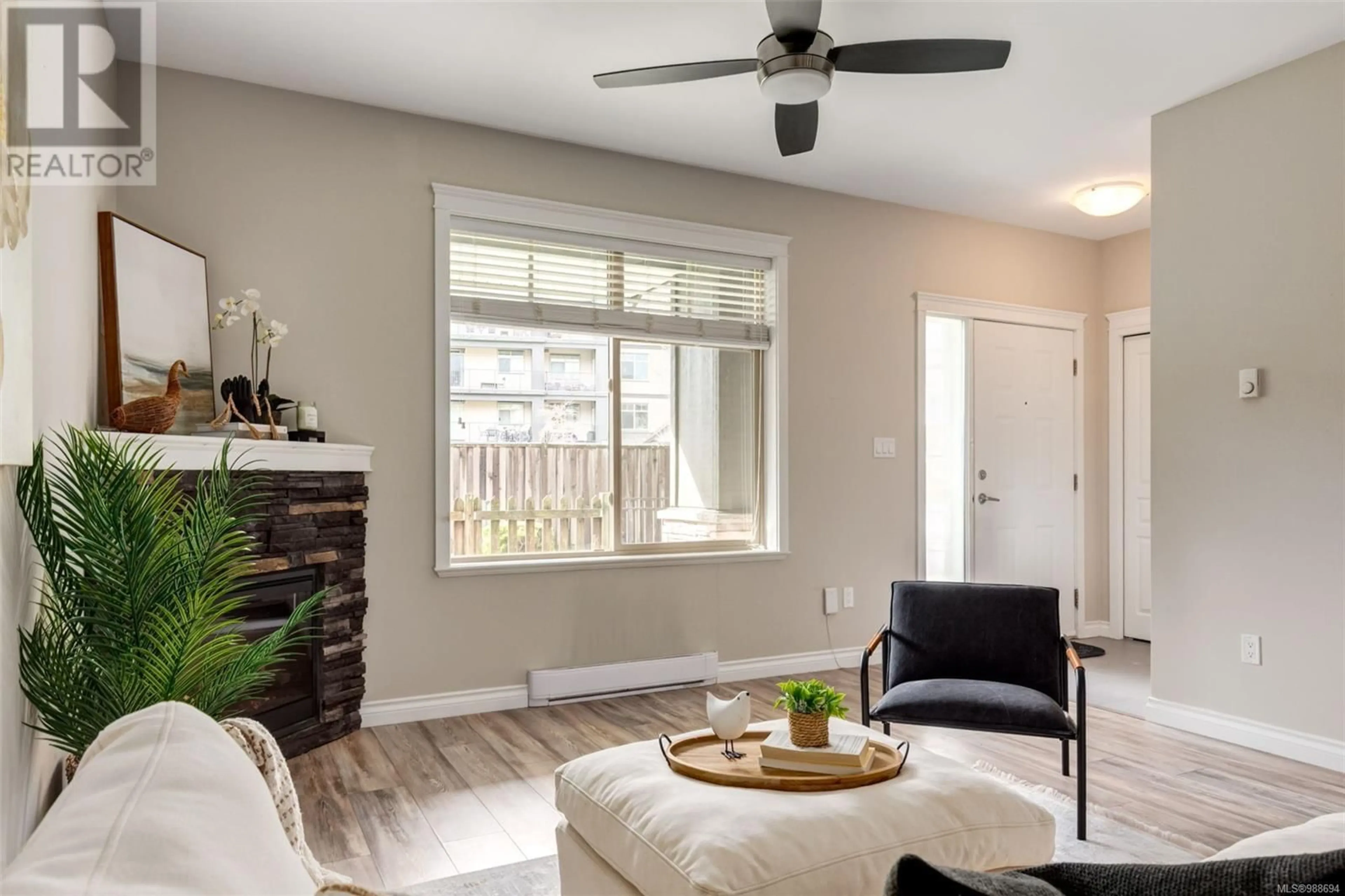 Living room with furniture, wood/laminate floor for 103 2117 Meredith Rd, Nanaimo British Columbia V9S2N2