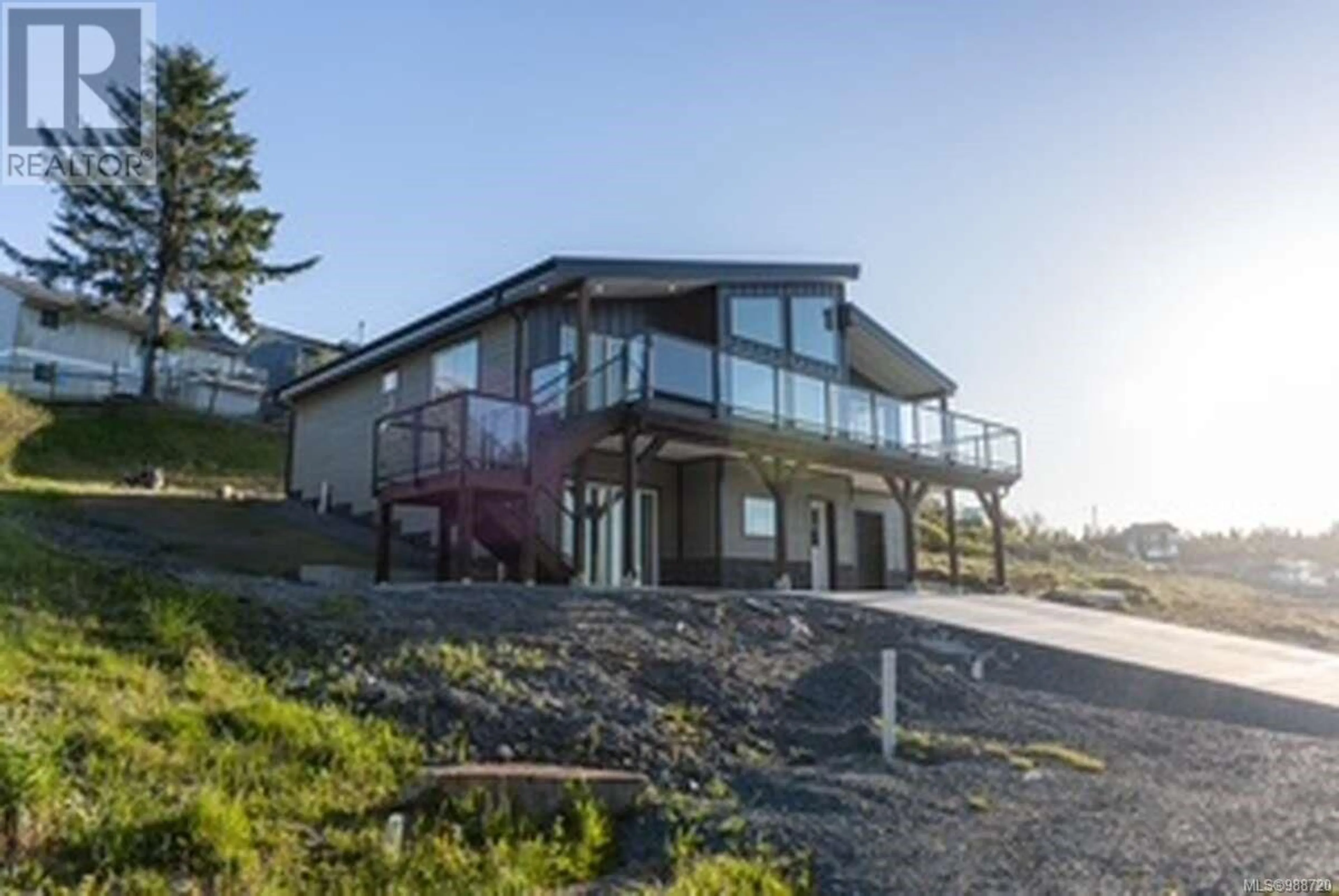 A pic from outside/outdoor area/front of a property/back of a property/a pic from drone, water/lake/river/ocean view for 2087 Pioneer Hill Dr, Port McNeill British Columbia V0N2R0