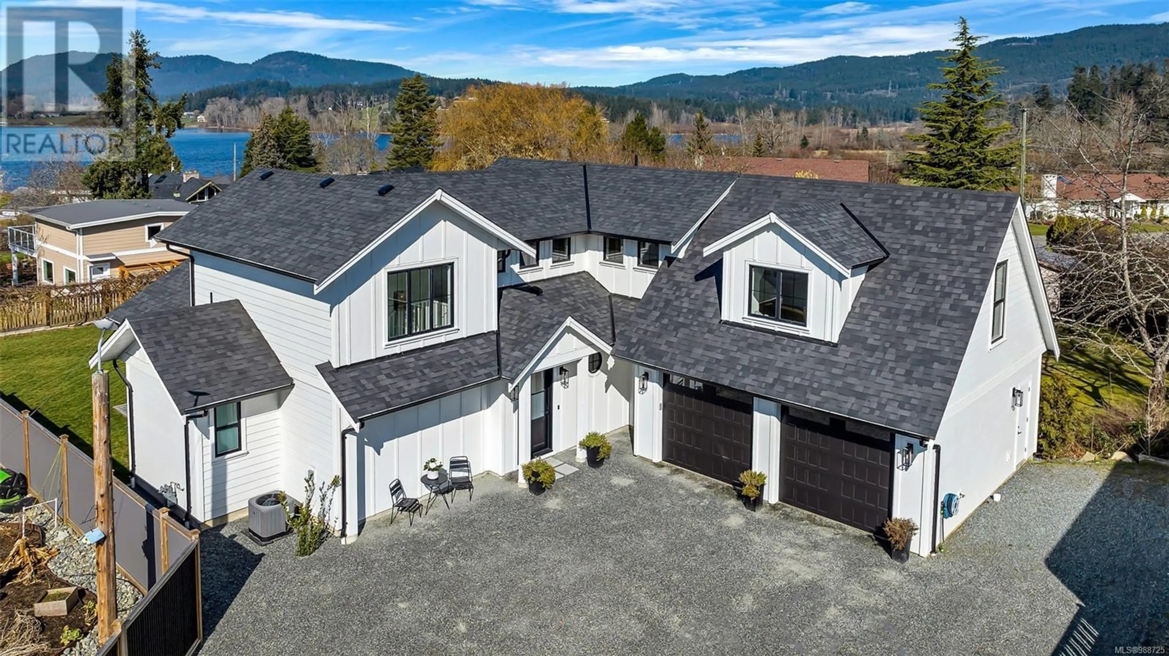 A pic from outside/outdoor area/front of a property/back of a property/a pic from drone, mountain view for 6291 Westlock Rd, Duncan British Columbia V9L5N8