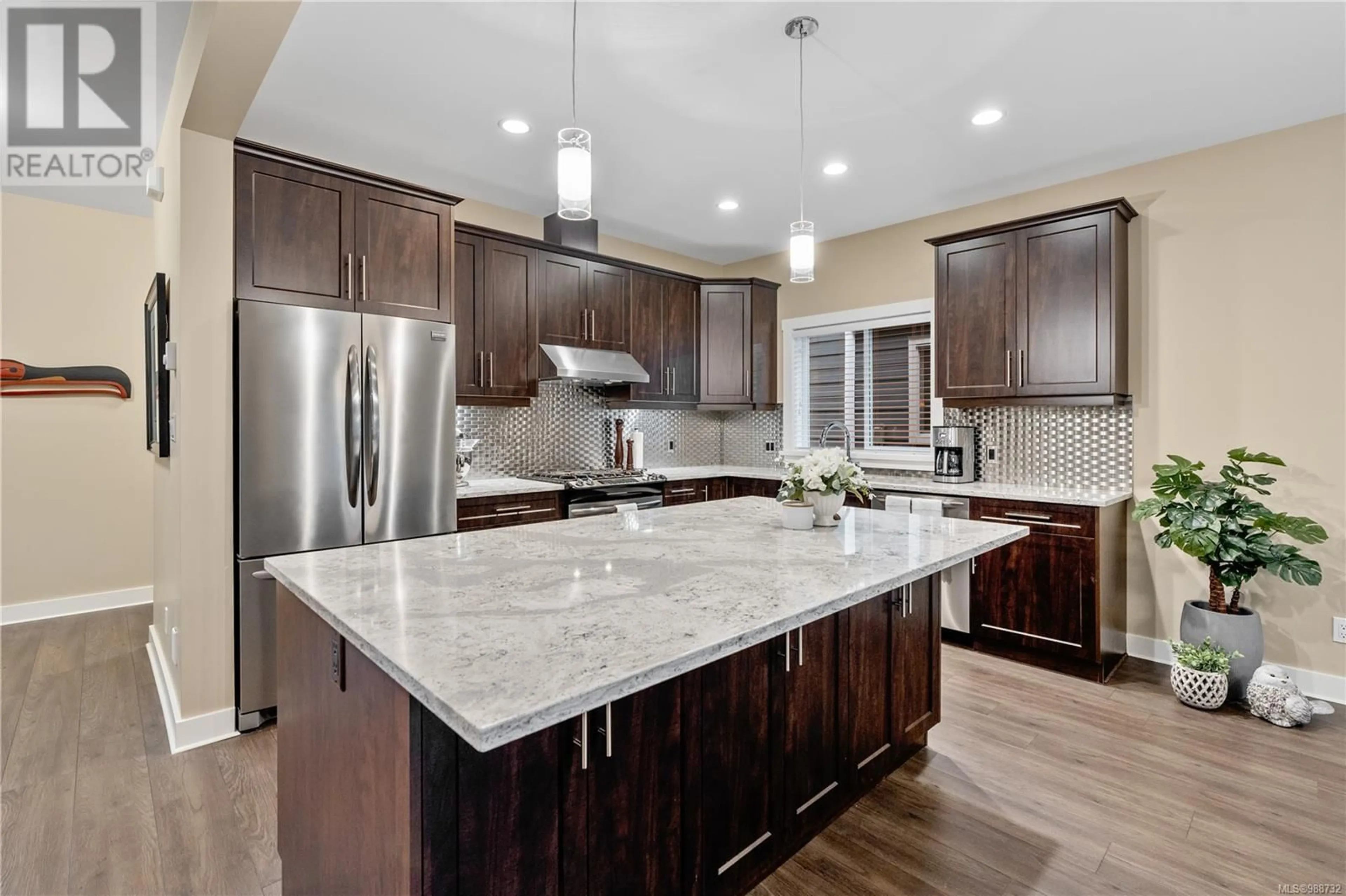 Open concept kitchen, ceramic/tile floor for 1022 Gala Crt, Langford British Columbia V9C0J8