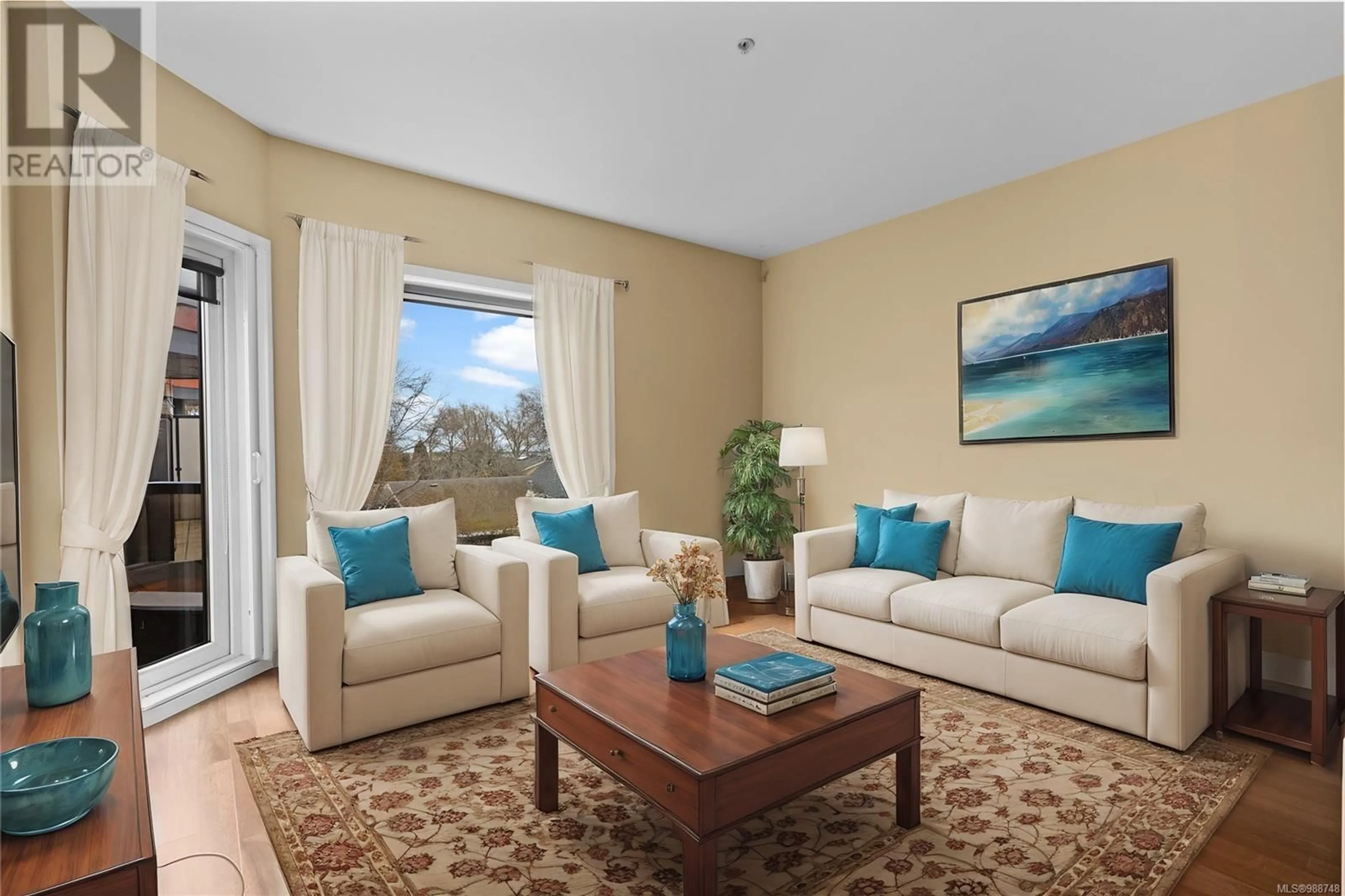 Living room with furniture, unknown for 202 - 2589 PENRHYN STREET, Saanich British Columbia V8N1G4