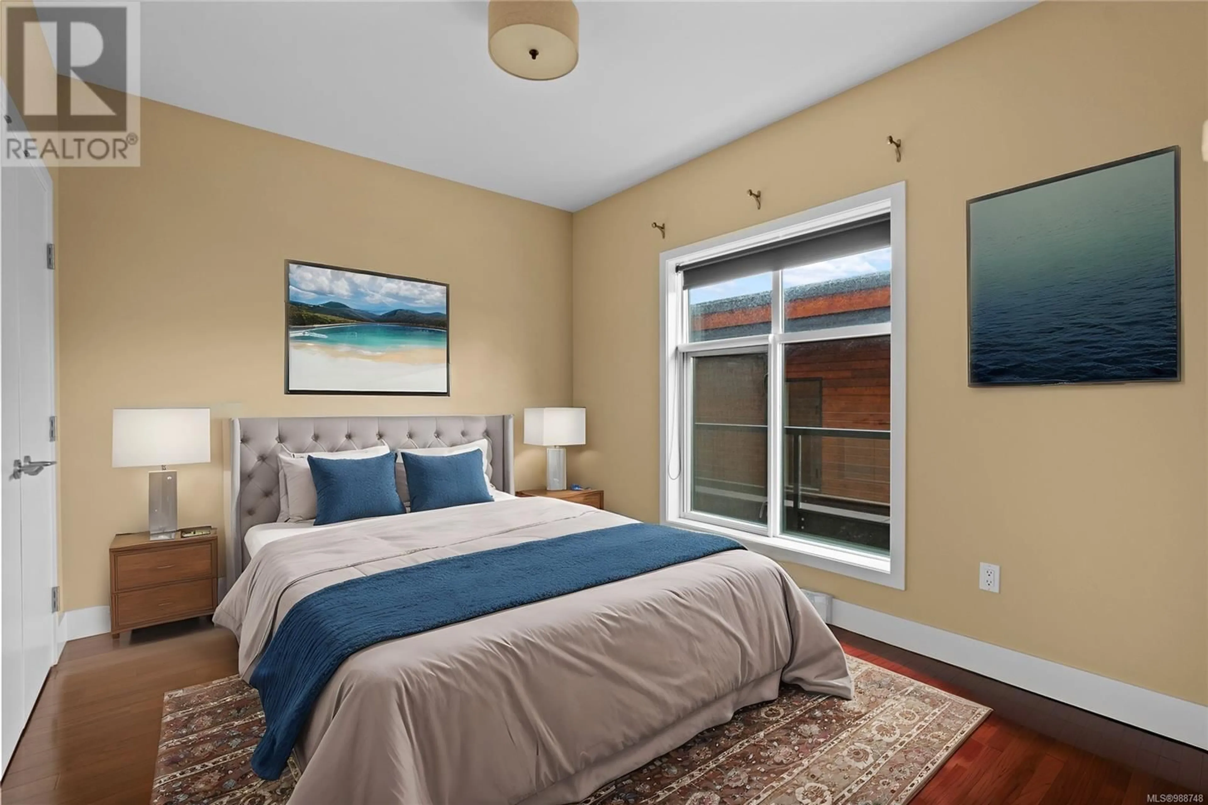 Bedroom with bed, unknown for 202 - 2589 PENRHYN STREET, Saanich British Columbia V8N1G4