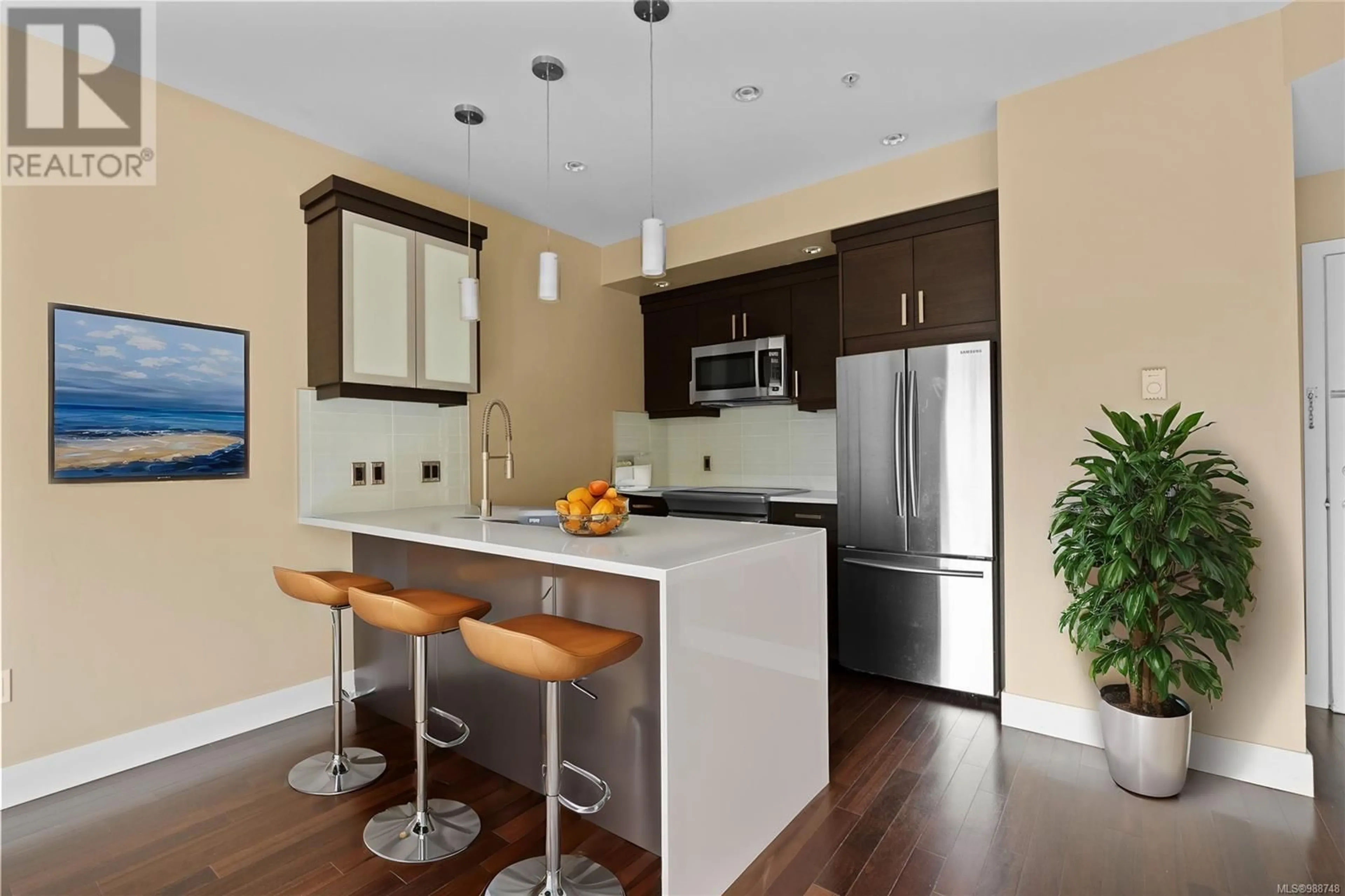 Open concept kitchen, unknown for 202 2589 Penrhyn St, Saanich British Columbia V8N1G4