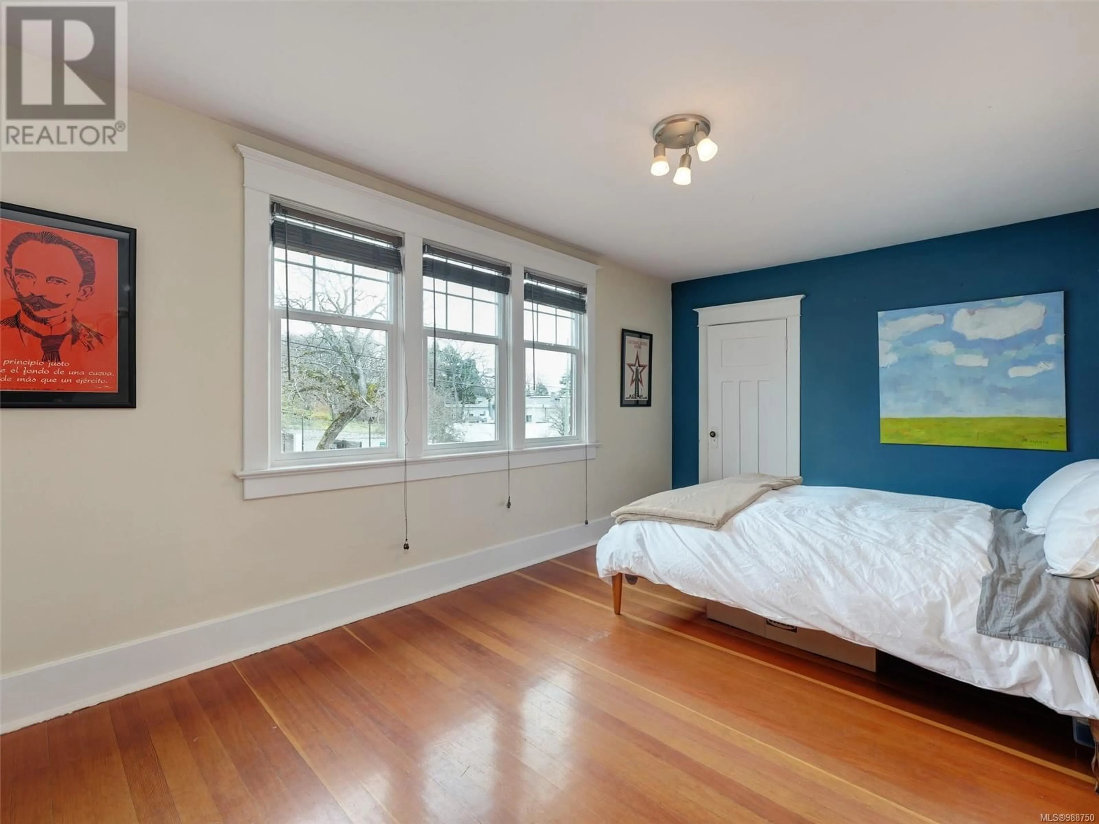 Bedroom with bed, wood/laminate floor for 2928 Blackwood St, Victoria British Columbia V8T3X2