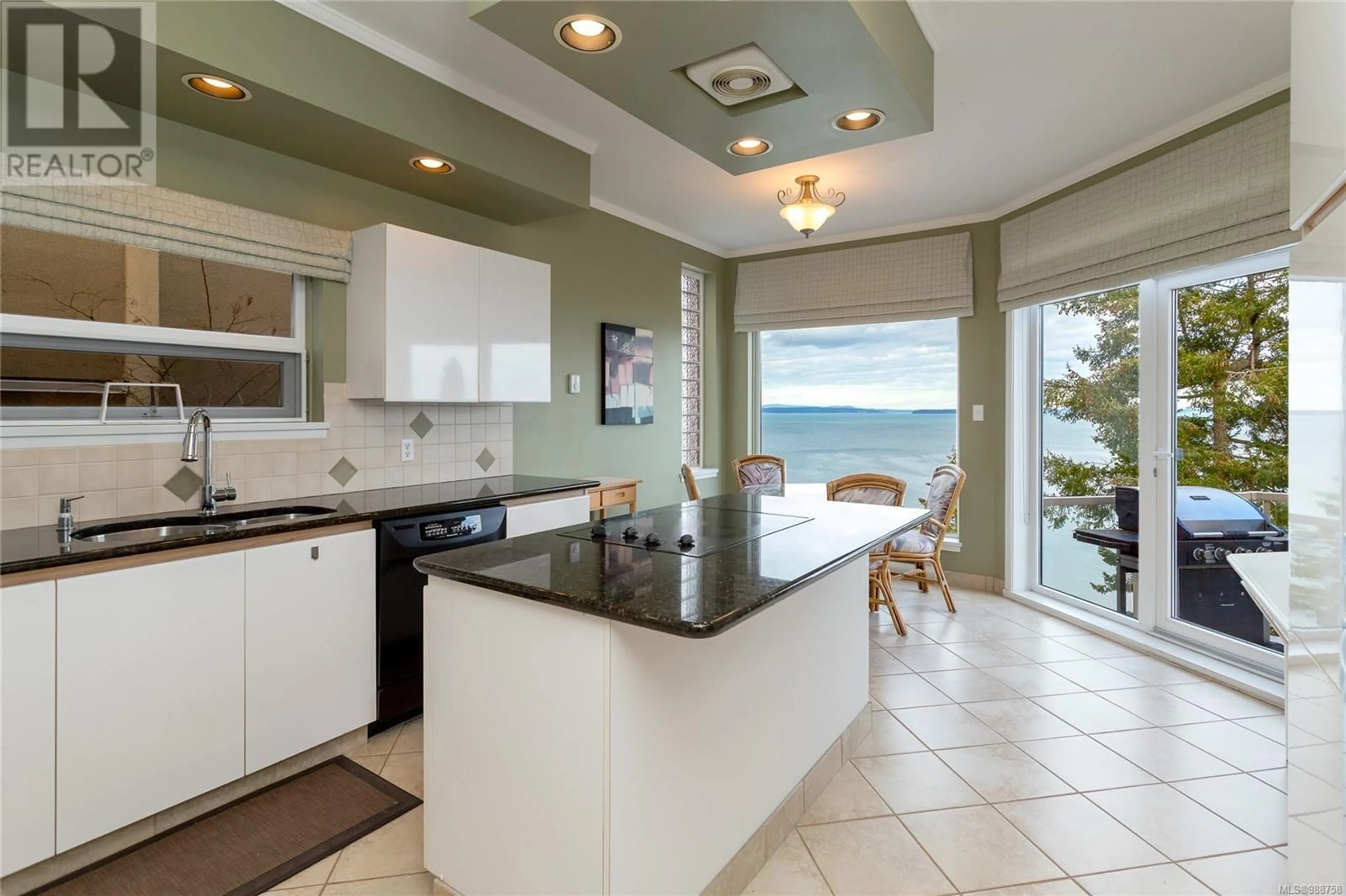 Open concept kitchen, ceramic/tile floor for 9 - 4771 CORDOVA BAY ROAD, Saanich British Columbia V9Y2J7
