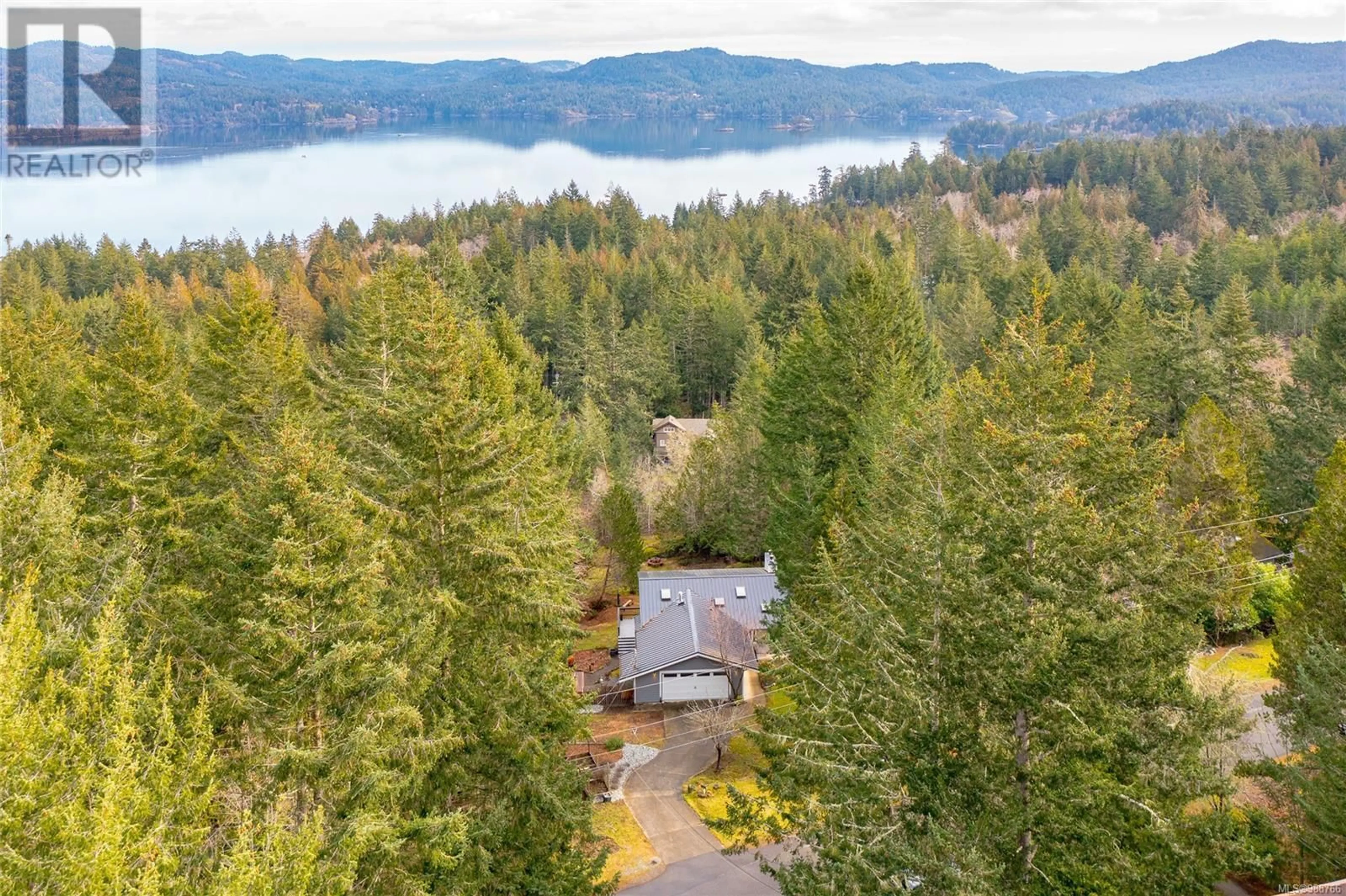 A pic from outside/outdoor area/front of a property/back of a property/a pic from drone, water/lake/river/ocean view for 1526 Winslow Dr, Sooke British Columbia V9Z1A9