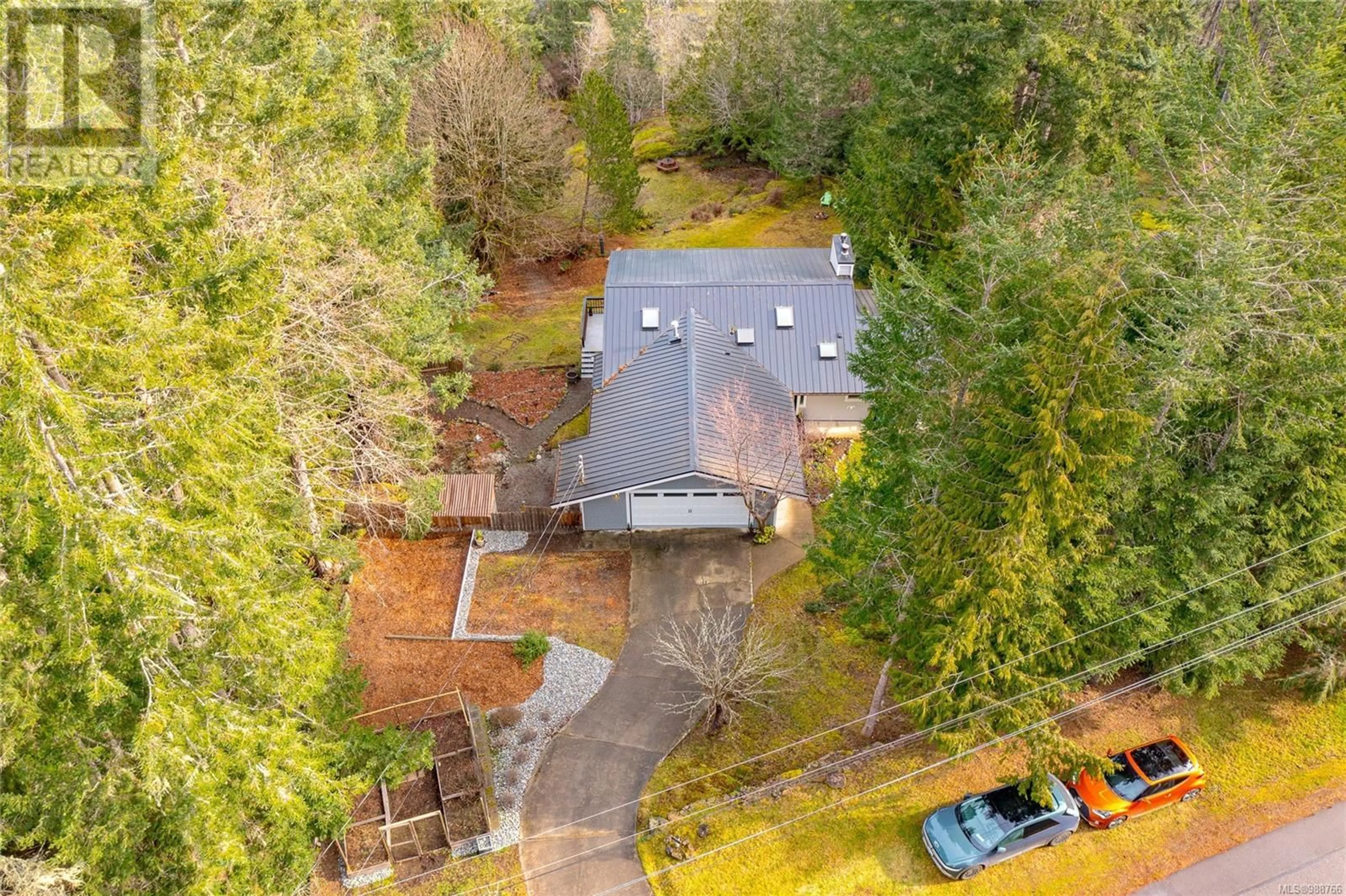 A pic from outside/outdoor area/front of a property/back of a property/a pic from drone, forest/trees view for 1526 Winslow Dr, Sooke British Columbia V9Z1A9