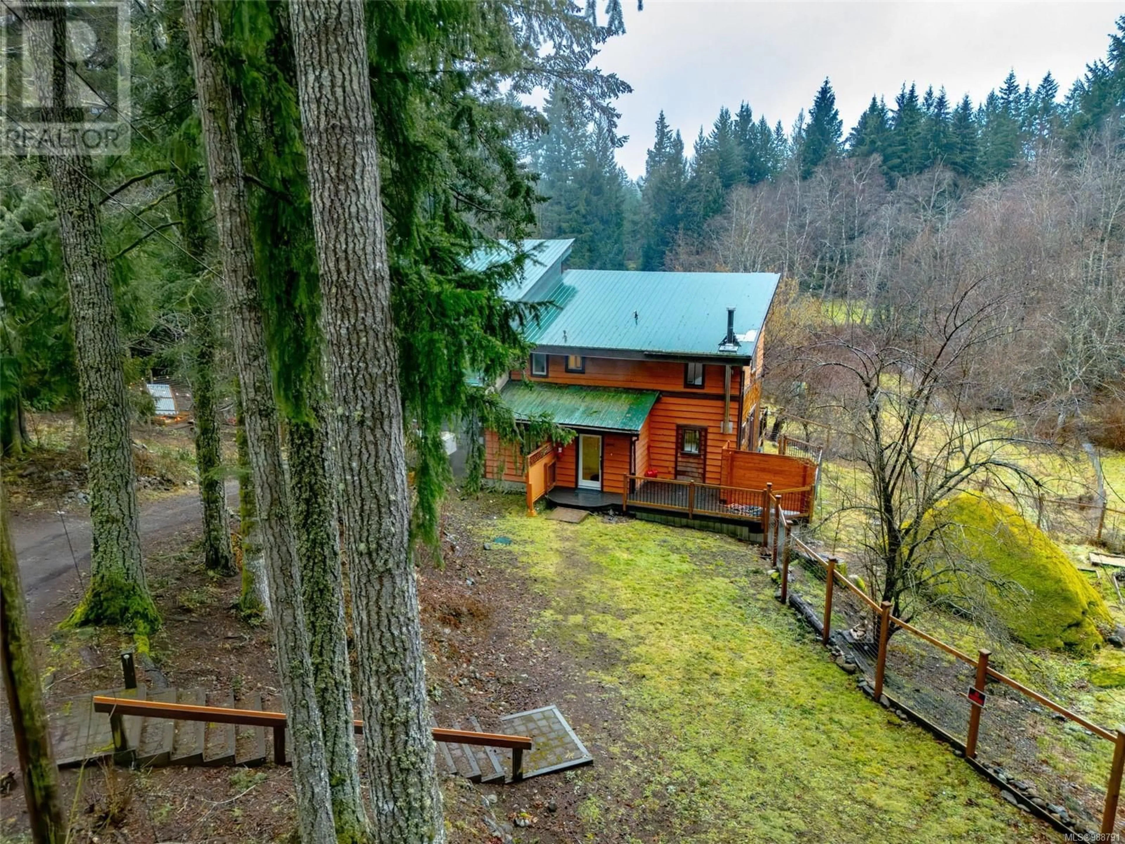 A pic from outside/outdoor area/front of a property/back of a property/a pic from drone, forest/trees view for 5004 Culverton Rd, Duncan British Columbia V9L6H4