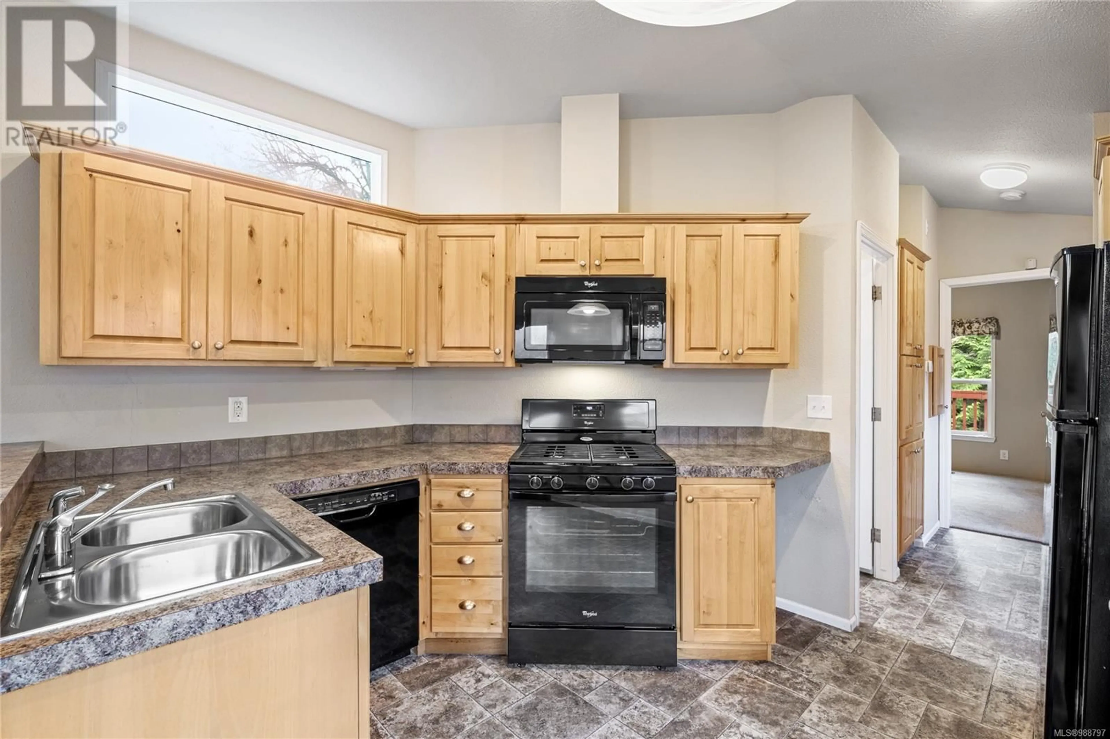 Standard kitchen, ceramic/tile floor for 124 3042 River Rd, Chemainus British Columbia V0R1K3